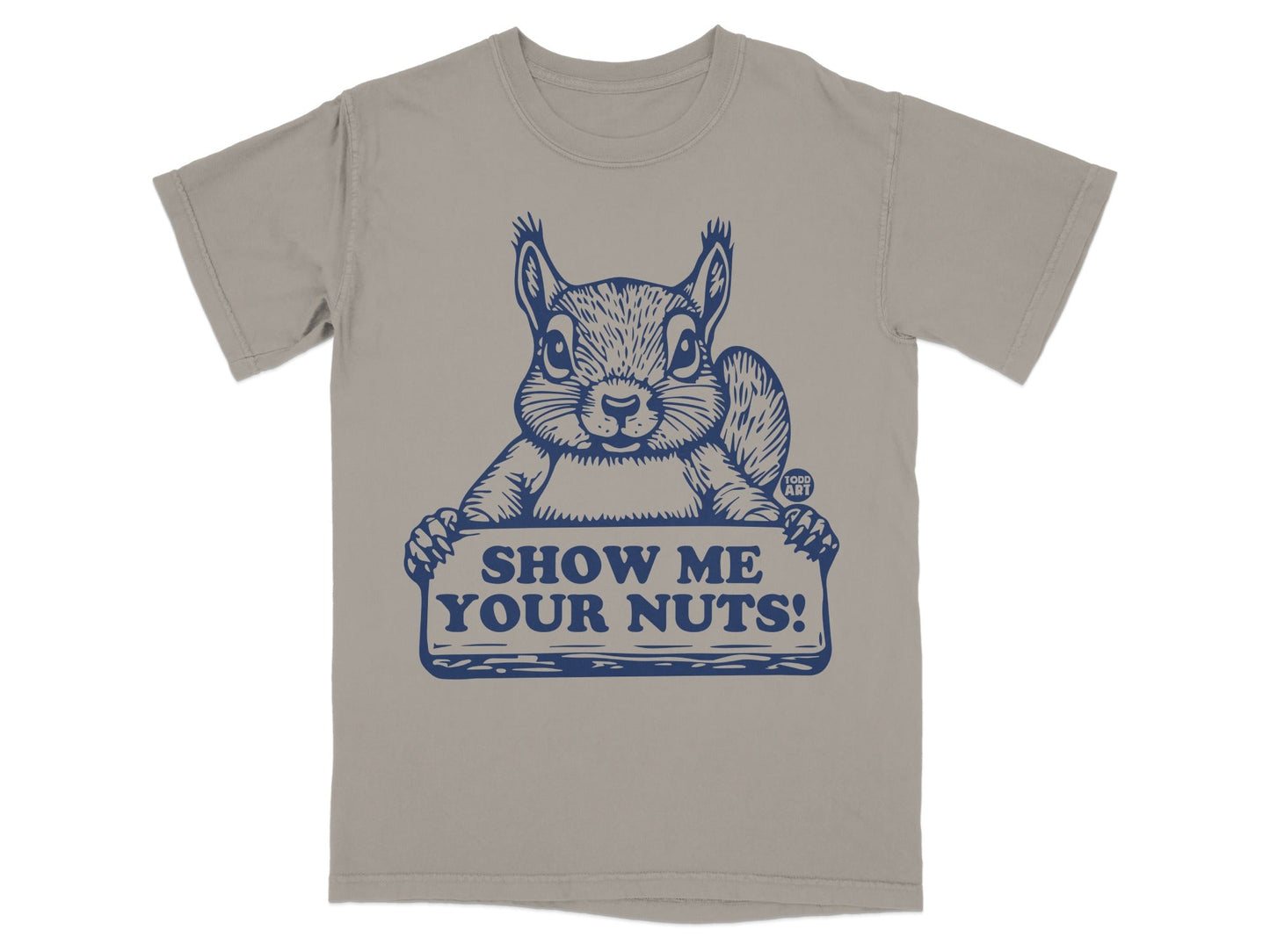 Brown t-shirt with navy graphic of a squirrel holding a sign that says "SHOW ME YOUR NUTS!".