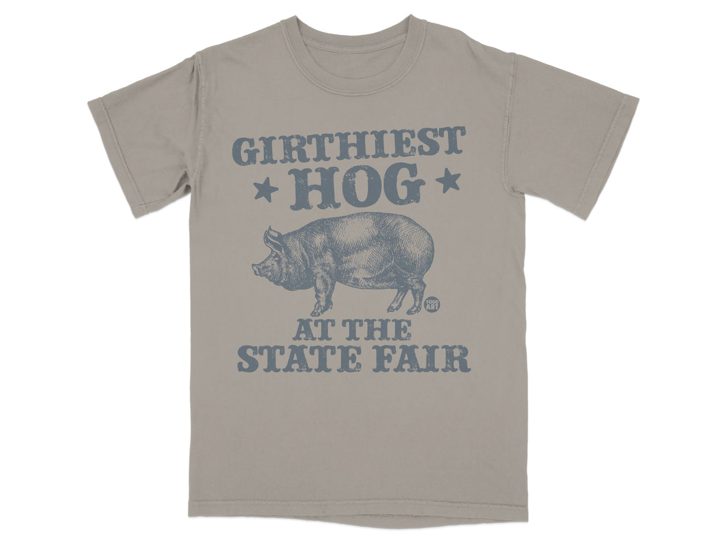 Girthiest hog at the state fair graphic on a tan t-shirt.