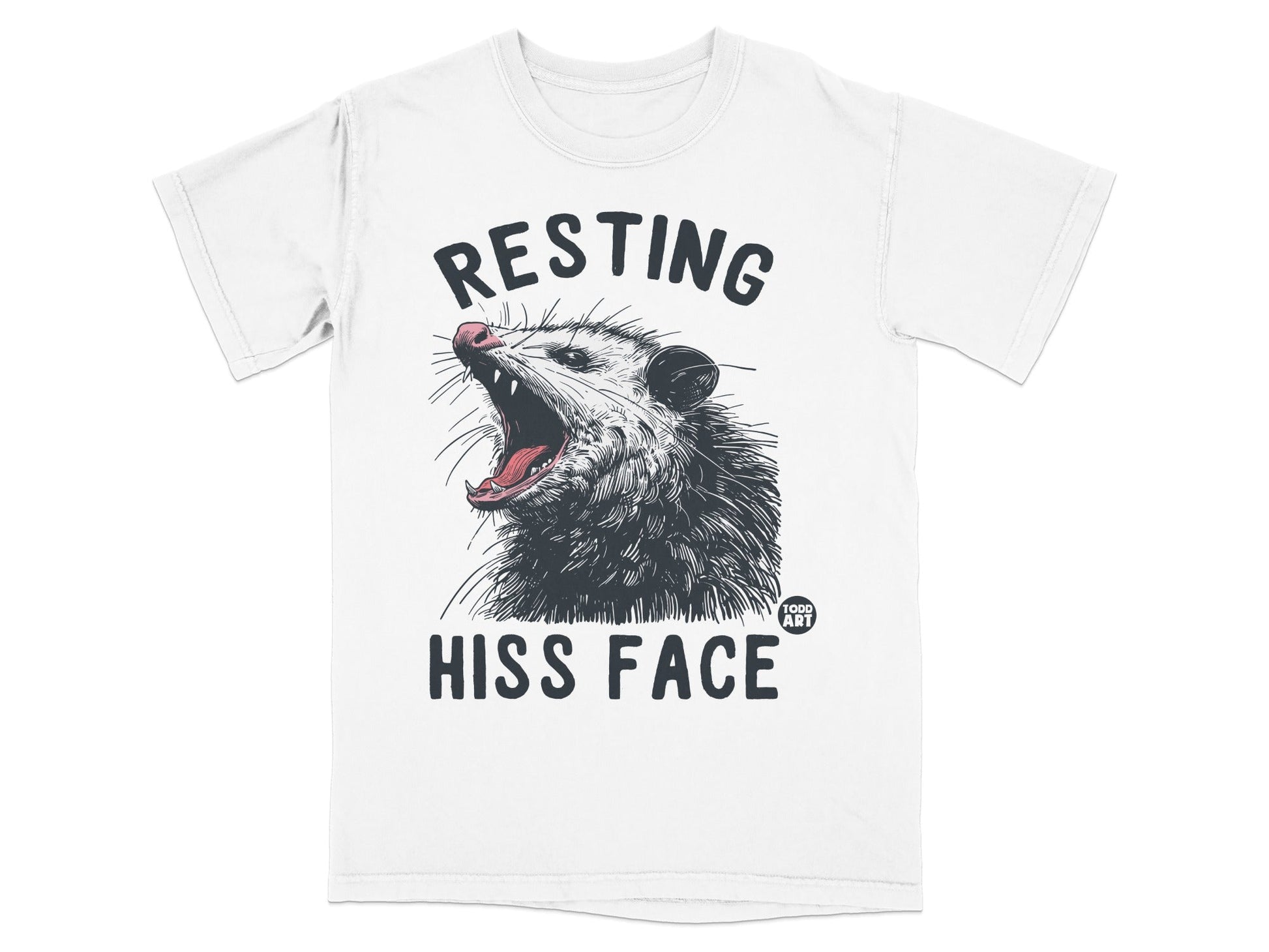White t-shirt with a graphic of a possum yawning, with text "RESTING HISS FACE".