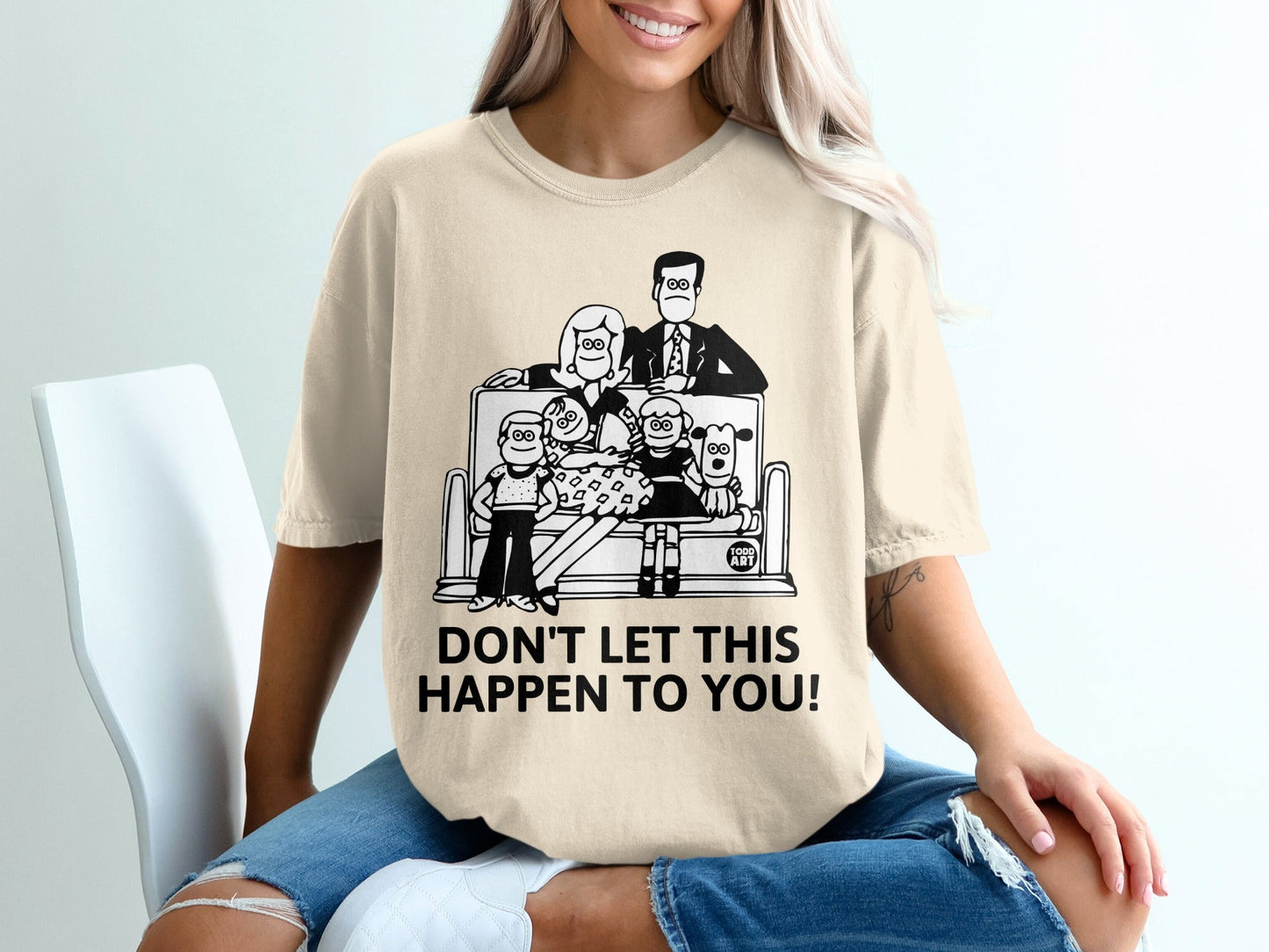 T-shirt with cartoon family playing slot machines, reads "DON'T LET THIS HAPPEN TO YOU!"