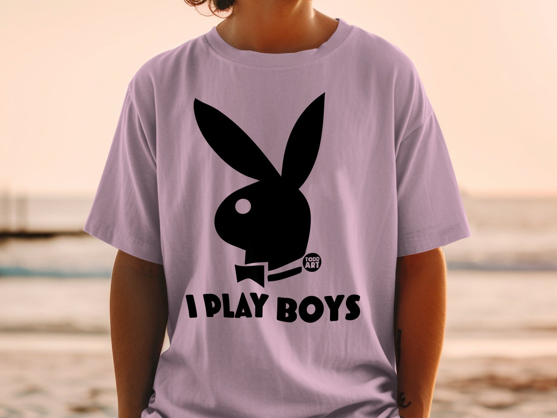 Light purple t-shirt with black Playboy bunny logo and "TODD ART I PLAY BOYS" text.