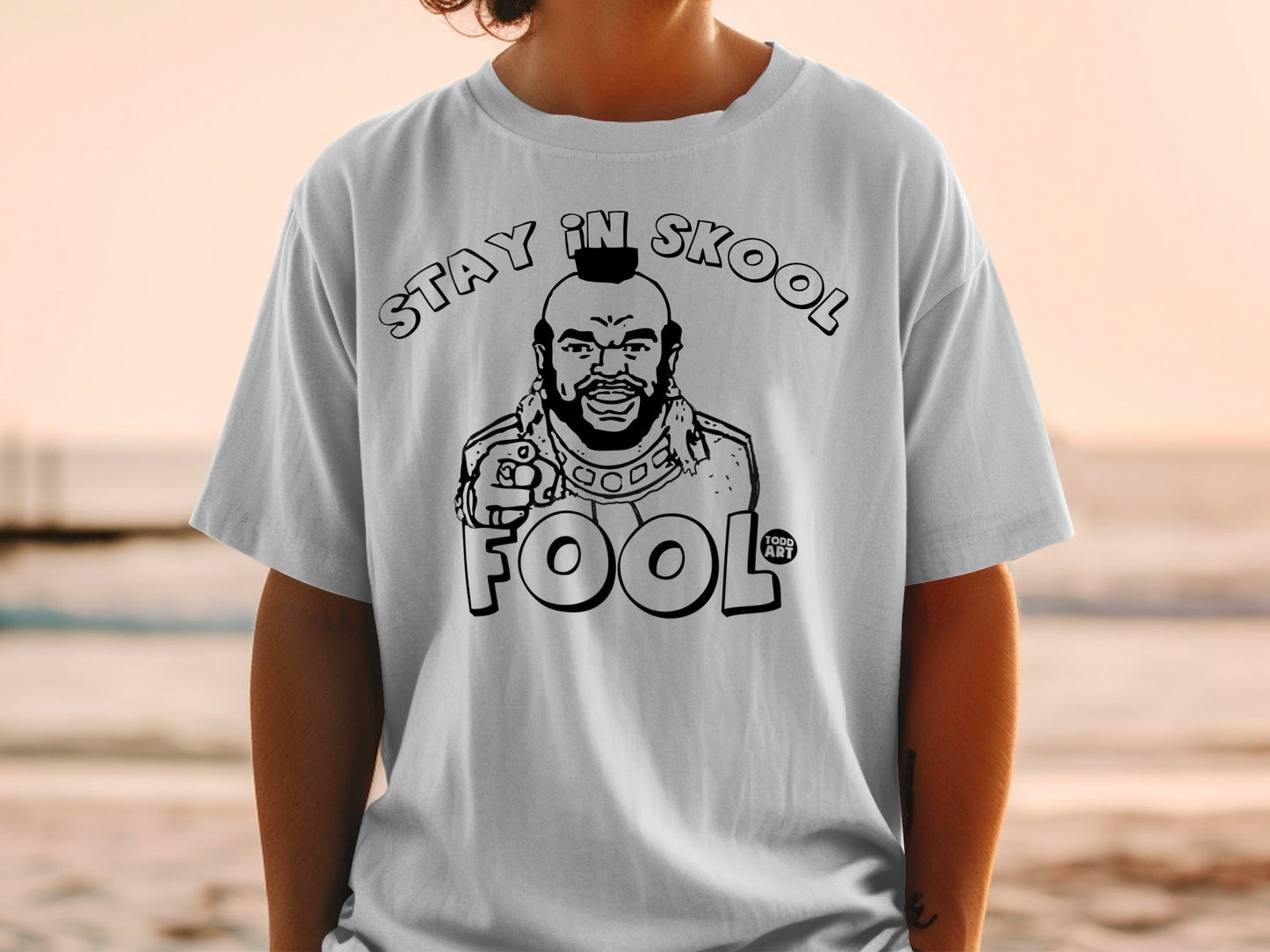 T-shirt with Mr. T illustration saying "Stay in Skool Fool".