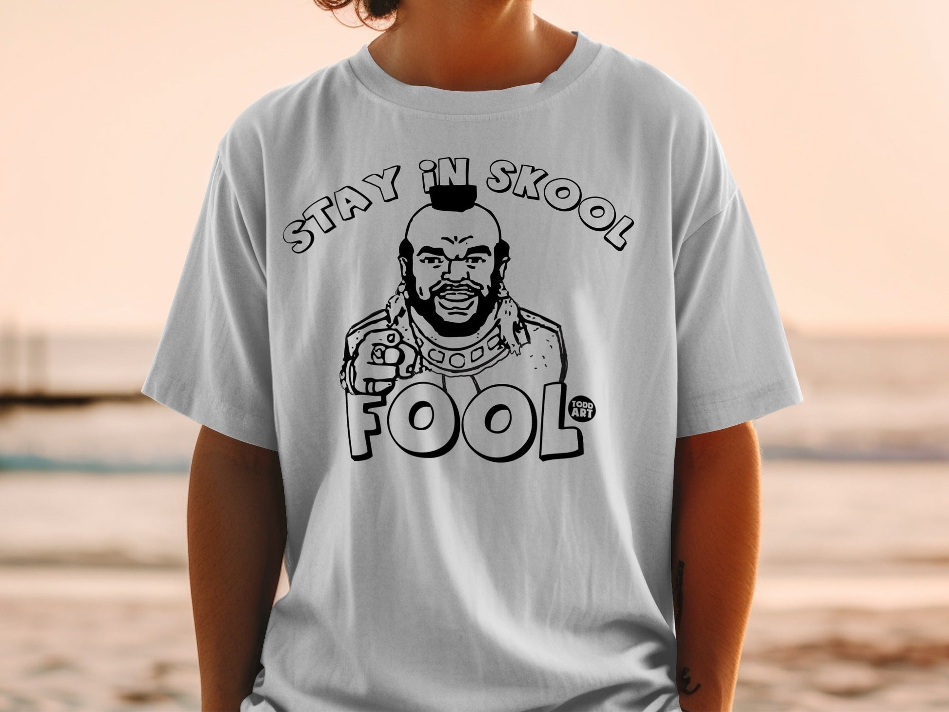 T-shirt with Mr. T illustration saying "Stay in Skool Fool".