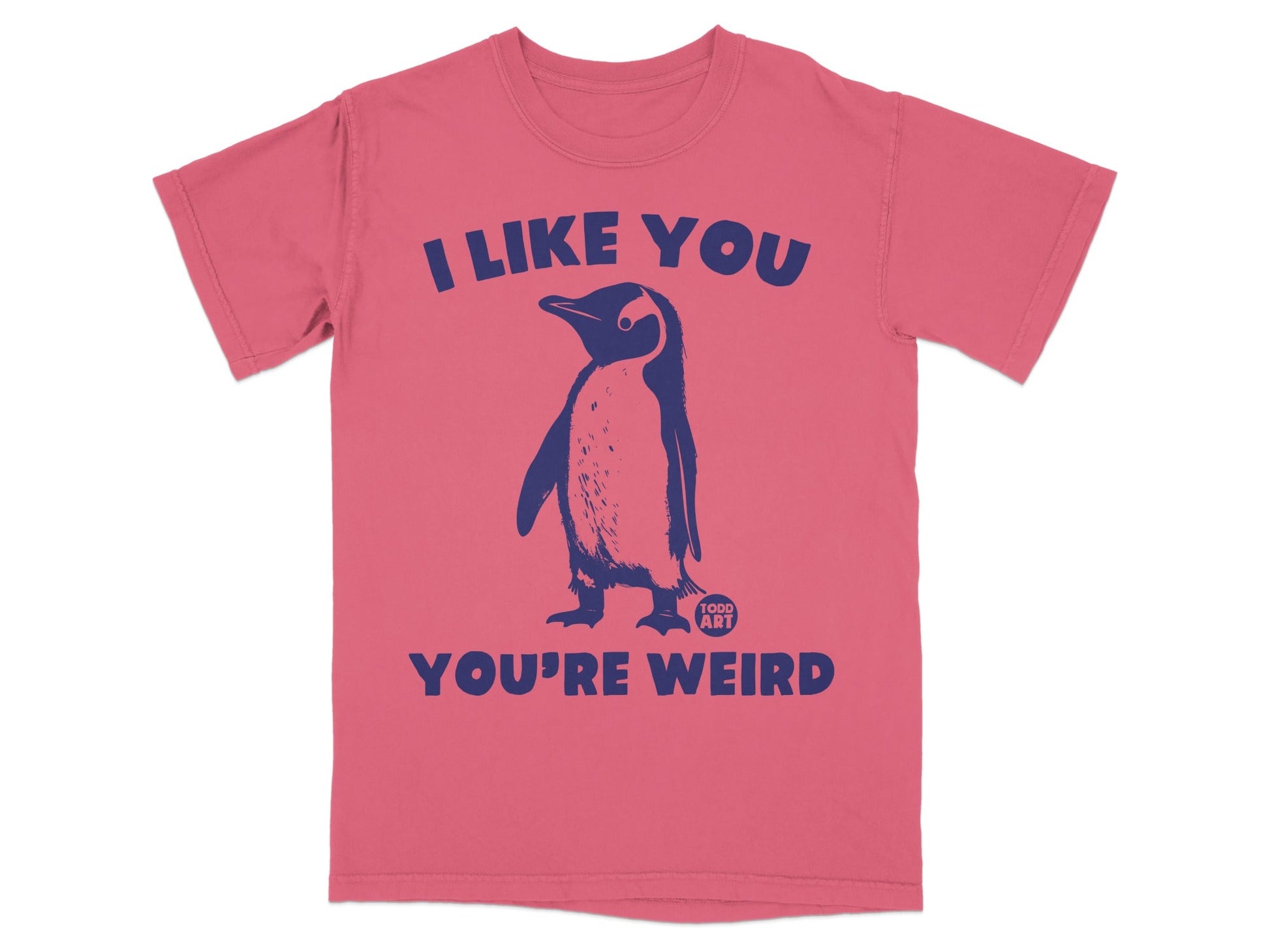 Pink t-shirt with a navy blue penguin and "I LIKE YOU YOU'RE WEIRD" text.