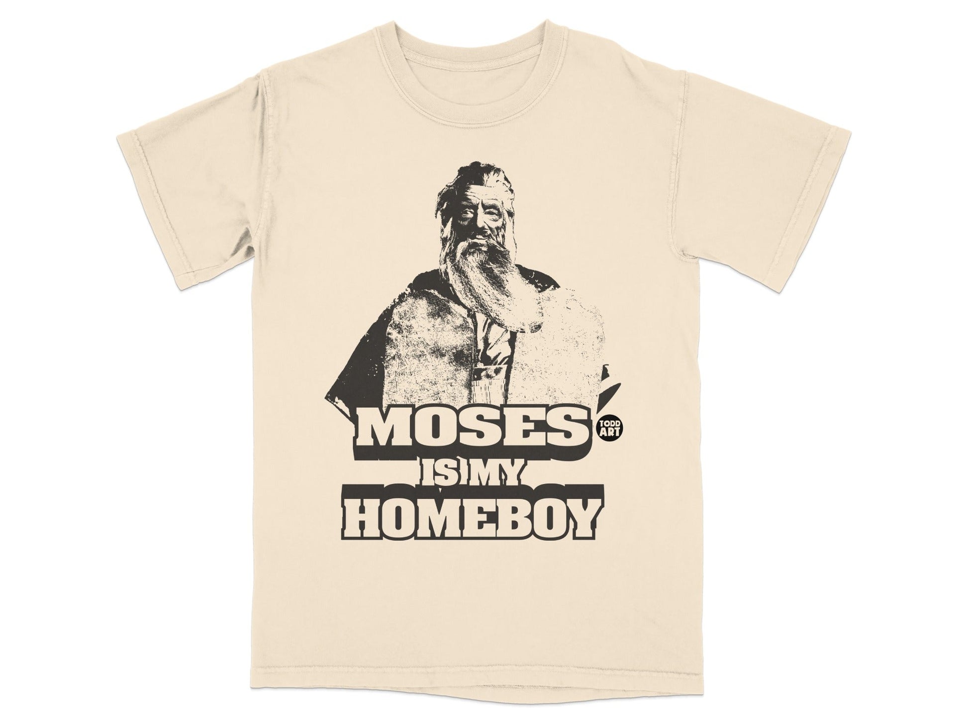 Beige t-shirt with a black graphic of Moses and text "MOSES IS MY HOMEBOY".