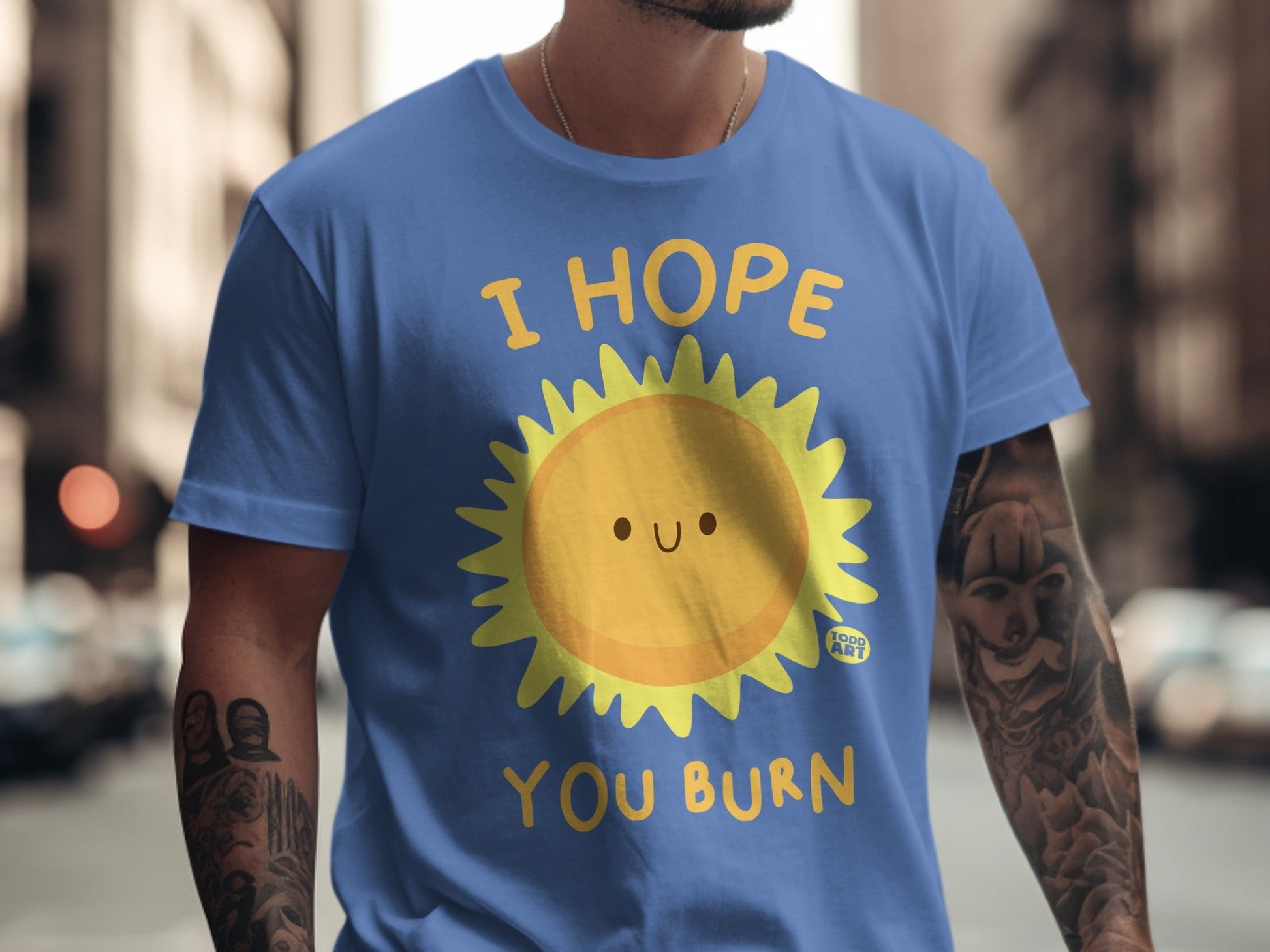 Blue t-shirt with smiling sun graphic and "I HOPE YOU BURN" text.