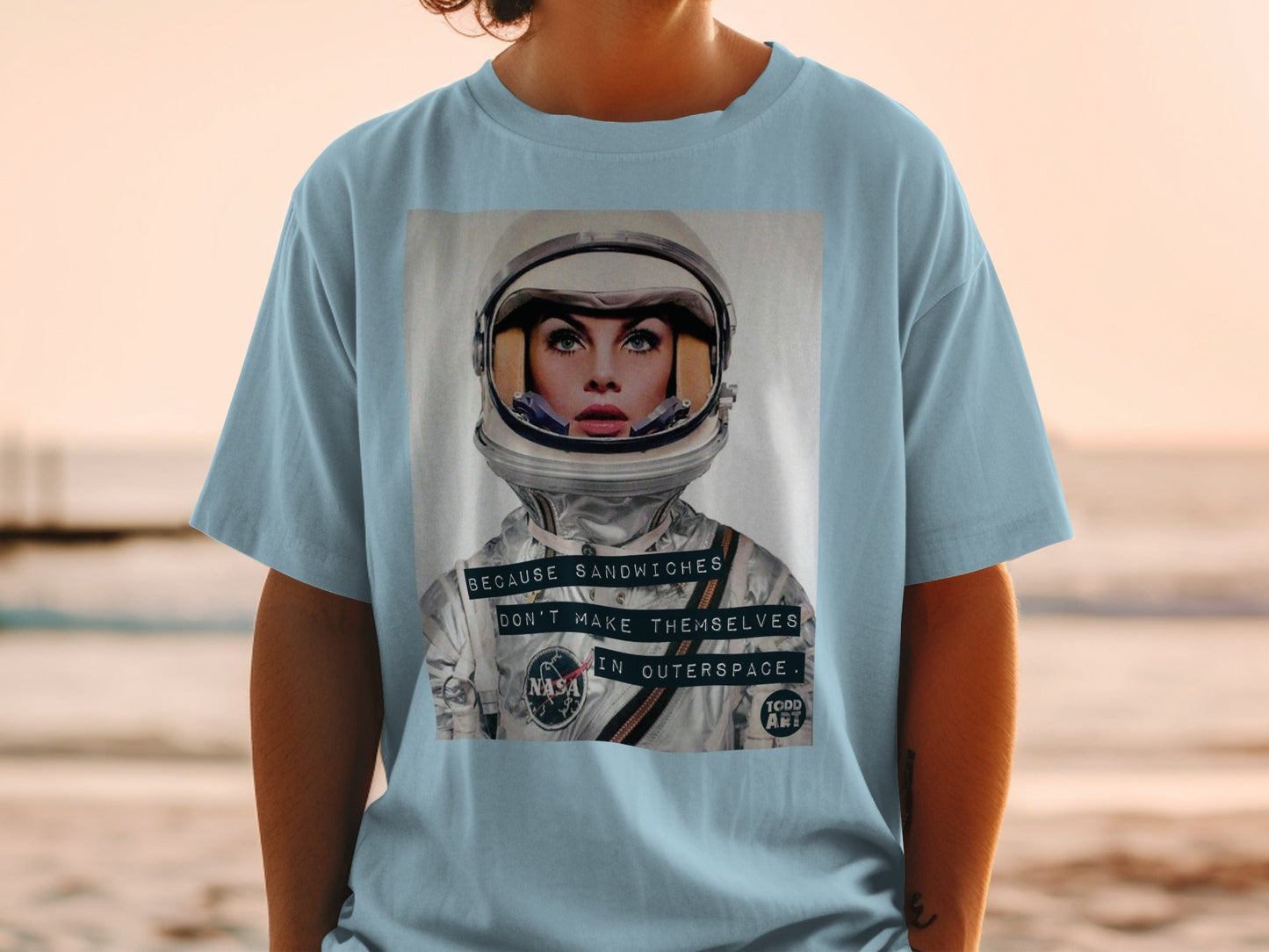 Astronaut in helmet with text "Because sandwiches don't make themselves in outer space."