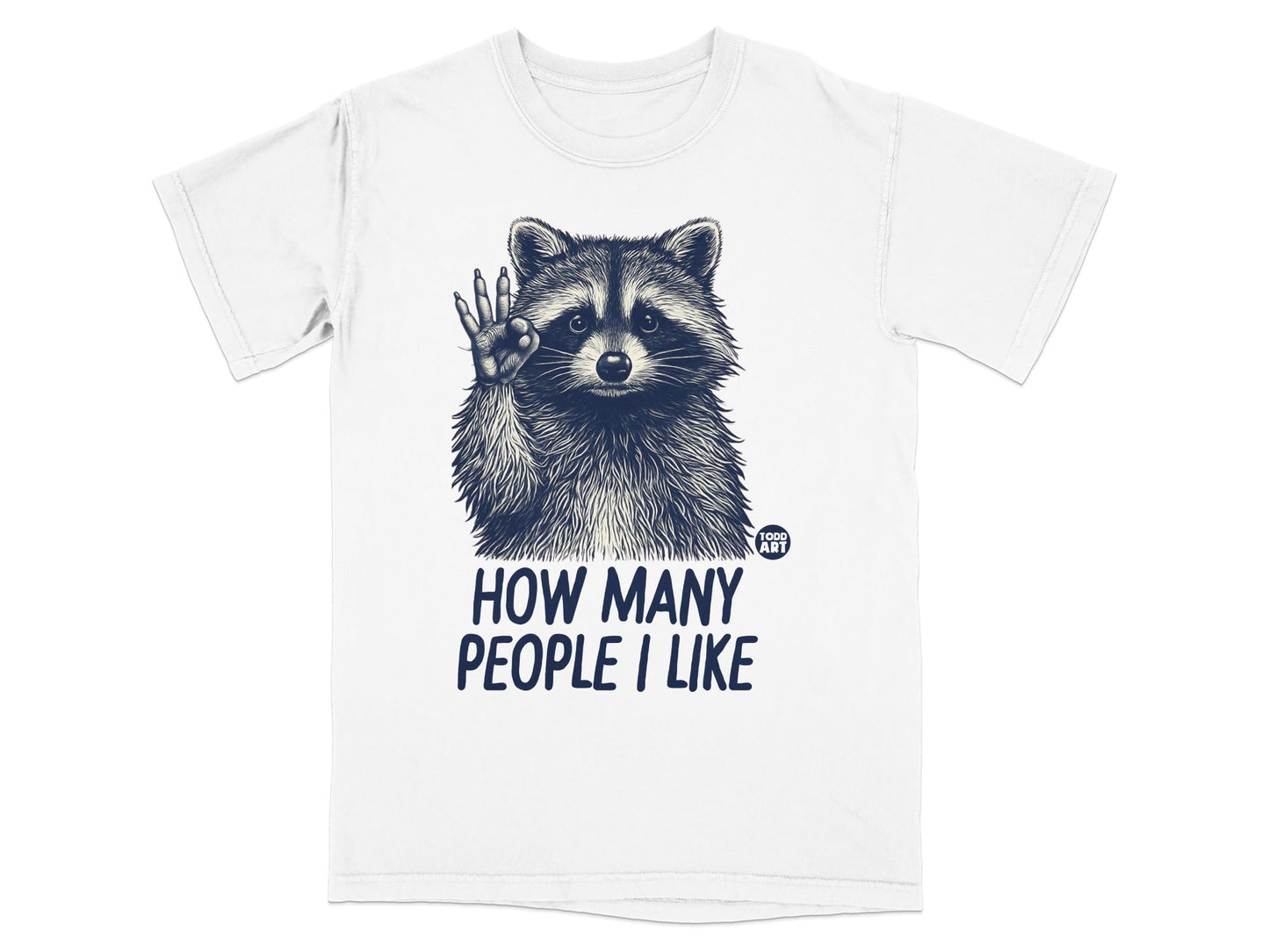White t-shirt with raccoon illustration and text "How Many People I Like".