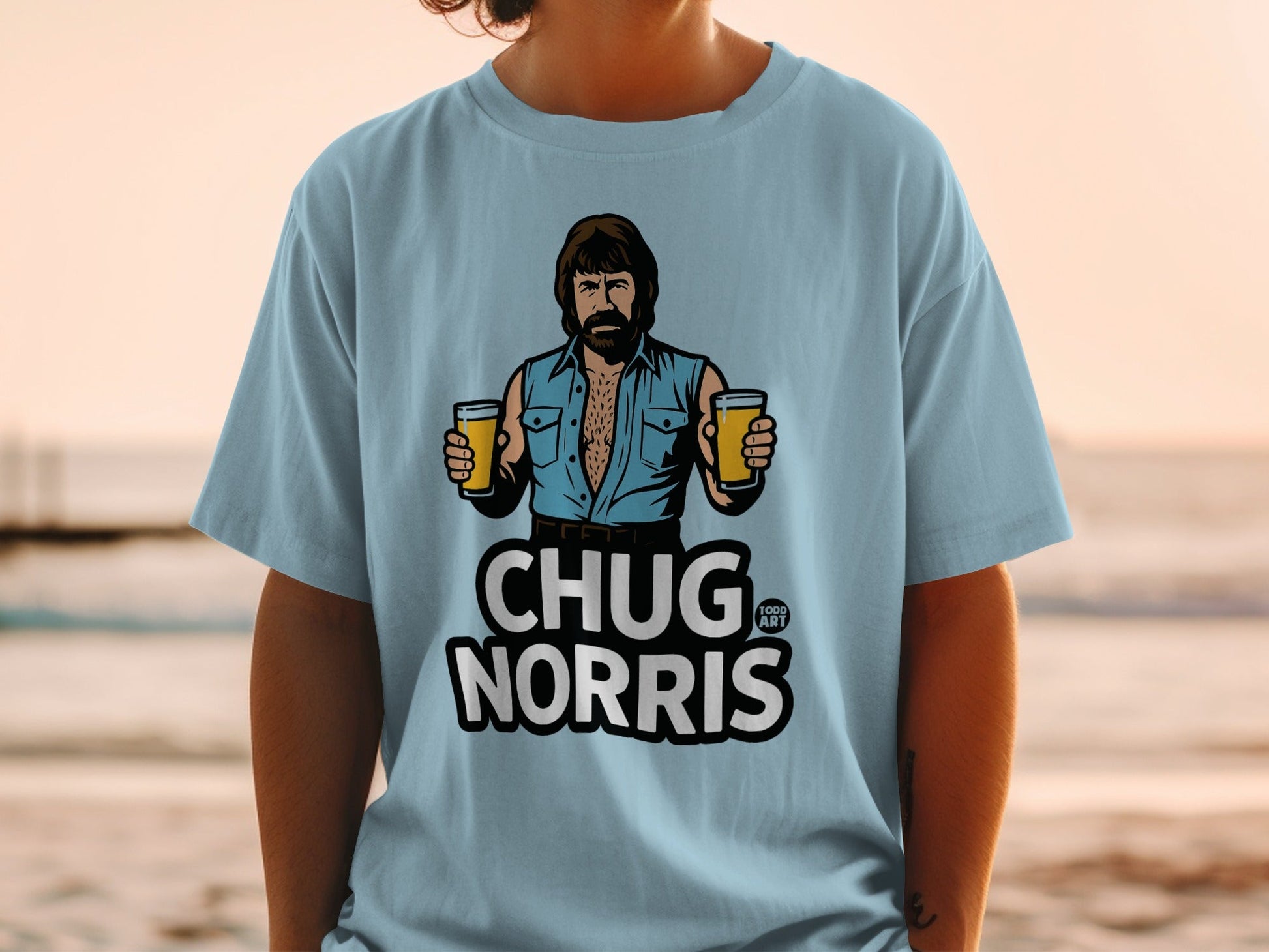 Chuck Norris wearing a denim shirt, holding two beers, with "CHUG NORRIS" text.