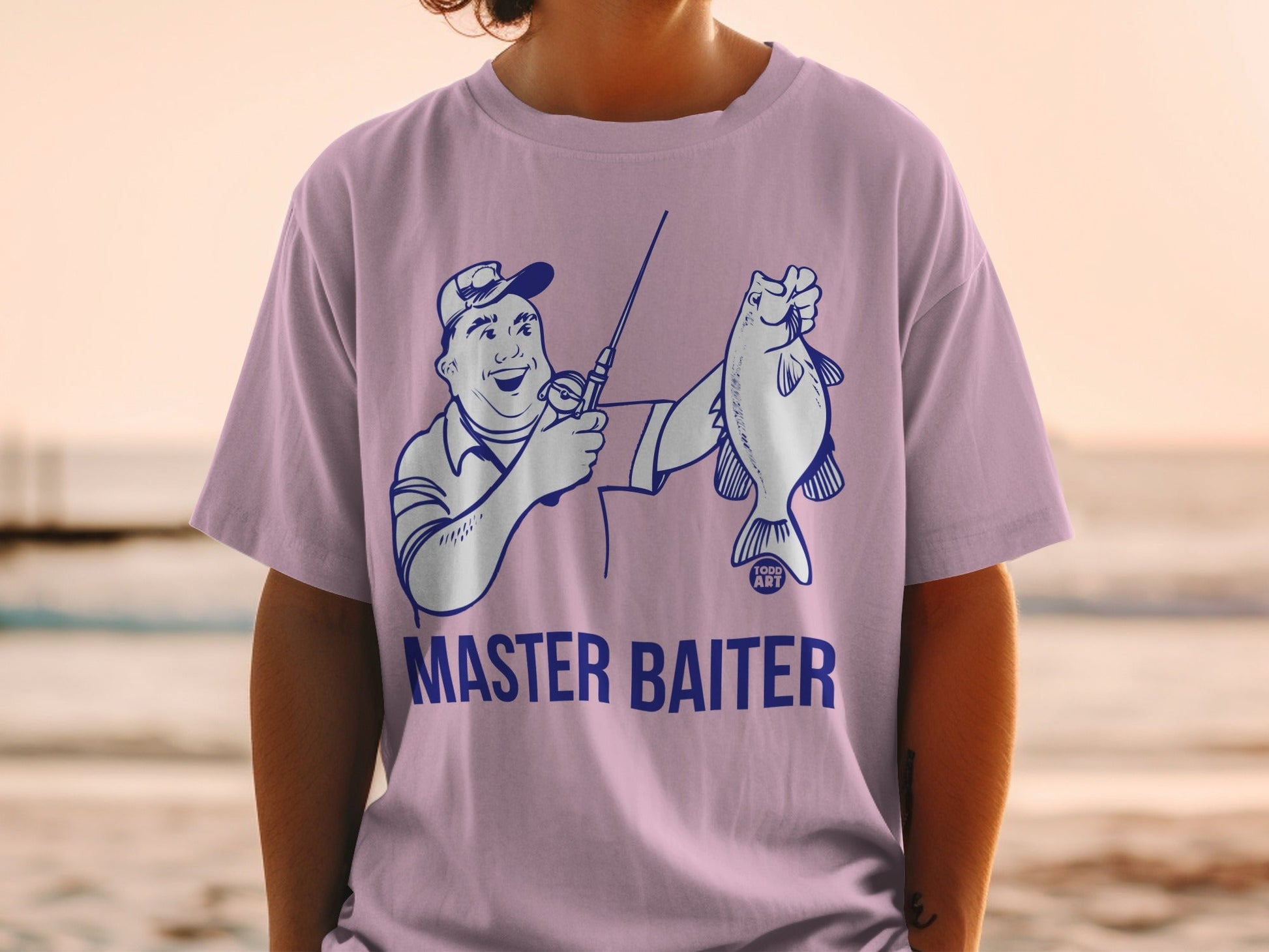 Illustration of a man holding a fish, wearing a "MASTER BAITER" t-shirt.
