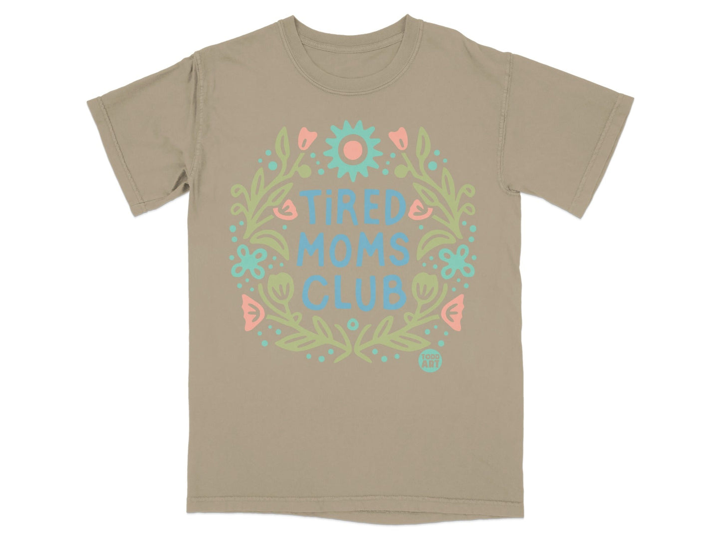T-shirt with "Tired Moms Club" text in a floral wreath.