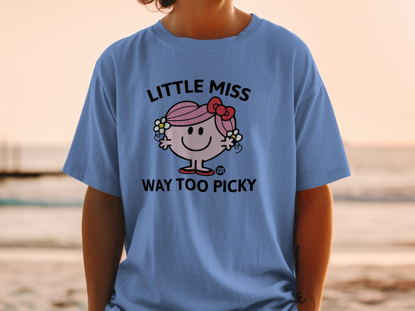 Blue t-shirt with "Little Miss Way Too Picky" text and cartoon character.