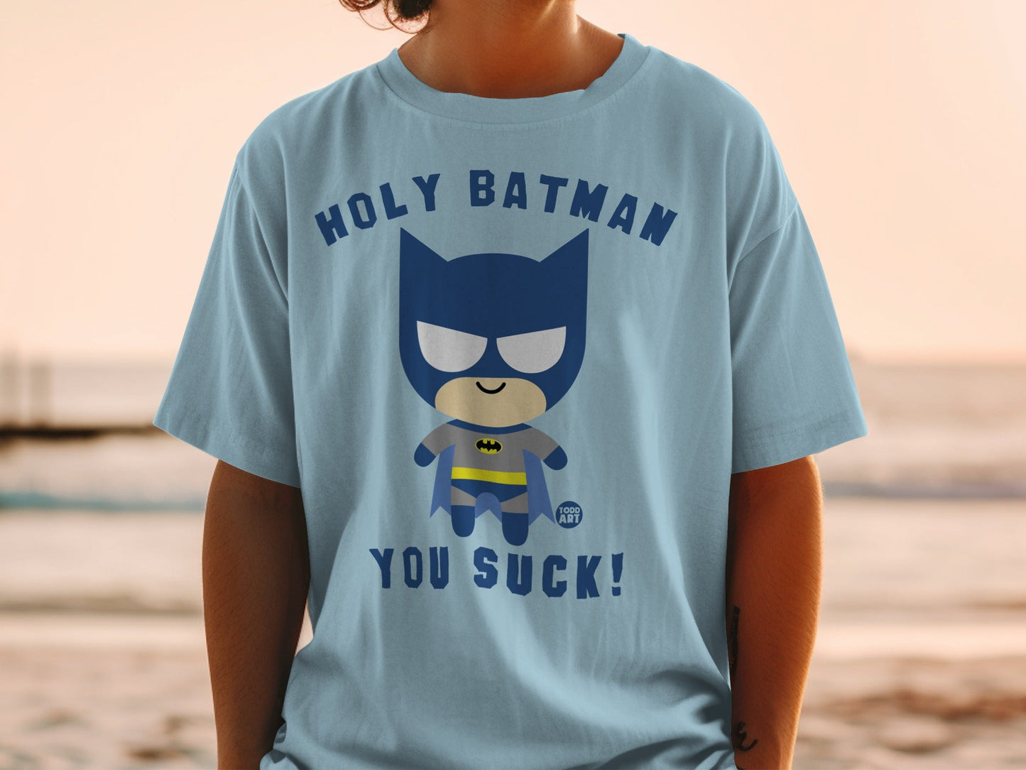 Chibi Batman graphic t-shirt with "HOLY BATMAN YOU SUCK!" text.