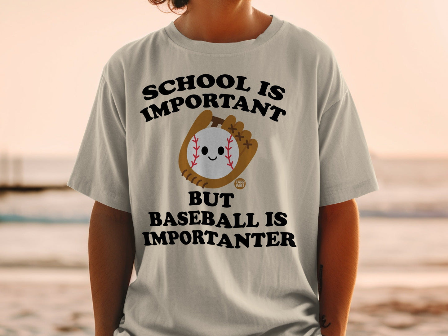 T-shirt with baseball, mitt, and text "SCHOOL IS IMPORTANT BUT BASEBALL IS IMPORTANTER".