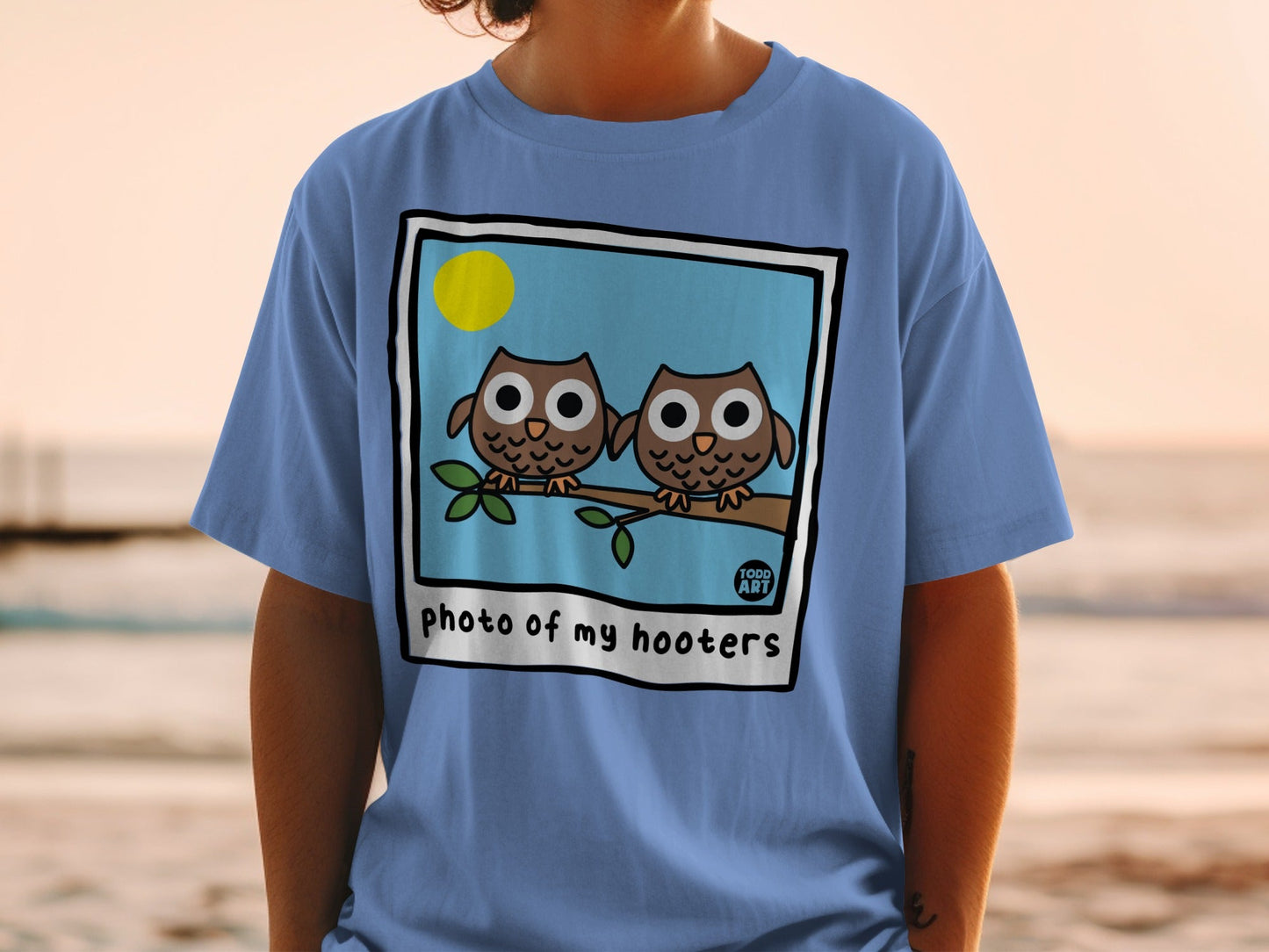 Two cartoon owls sit on a branch, "photo of my hooters" text below.