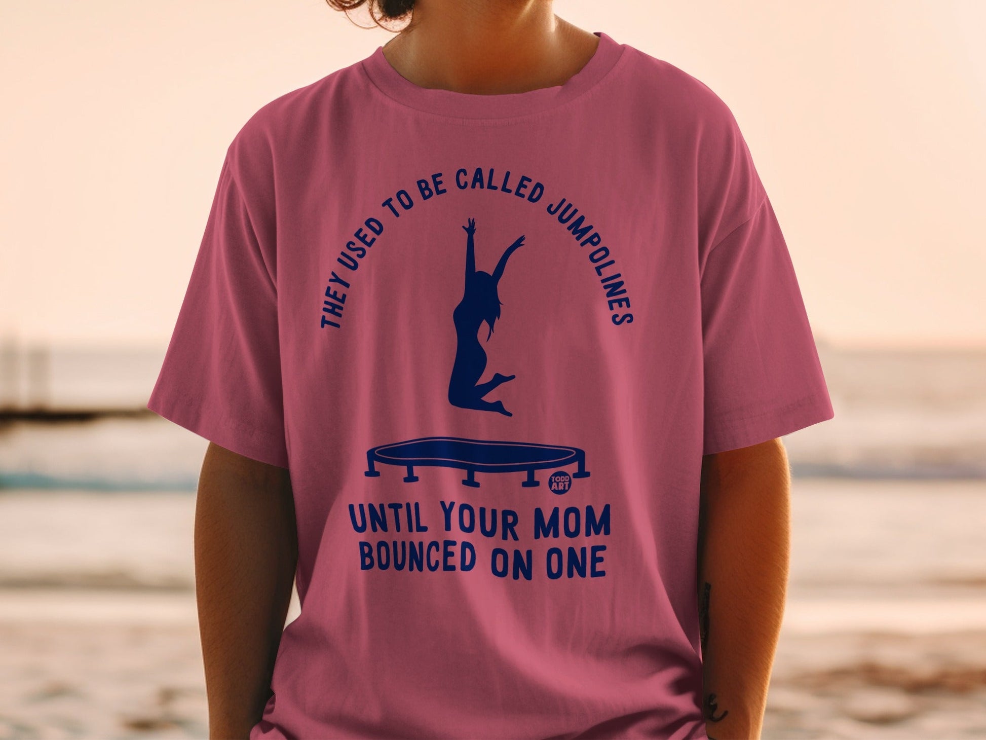 T-shirt with jumping silhouette and text about trampolines.