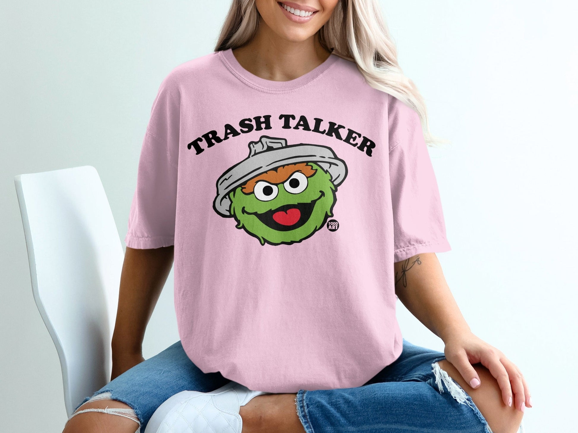 Oscar the Grouch "Trash Talker" graphic t-shirt on a person.