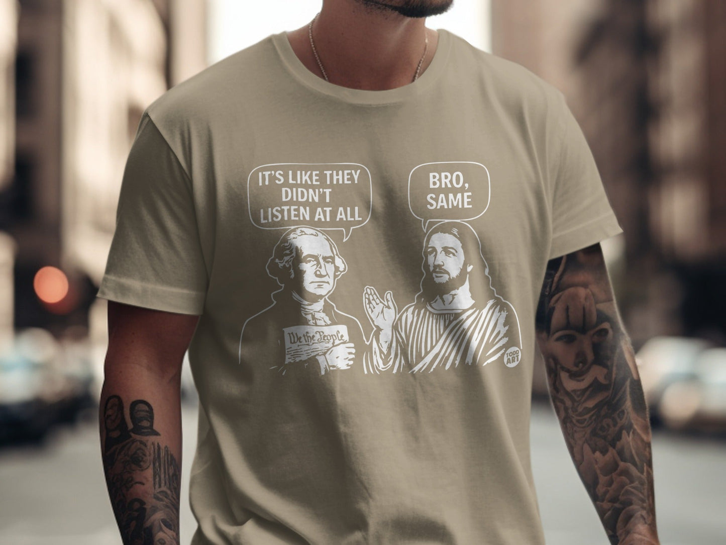 T-shirt with graphic of George Washington and Jesus discussing "We the People."