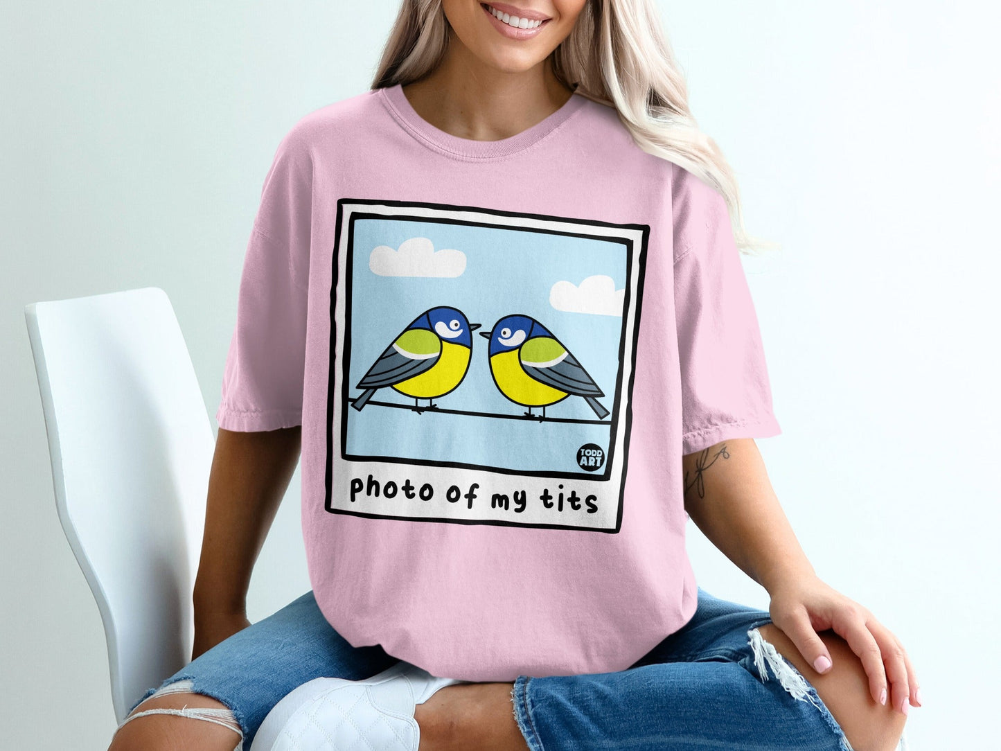 Pink t-shirt with "photo of my tits" text and two blue tits on a wire.