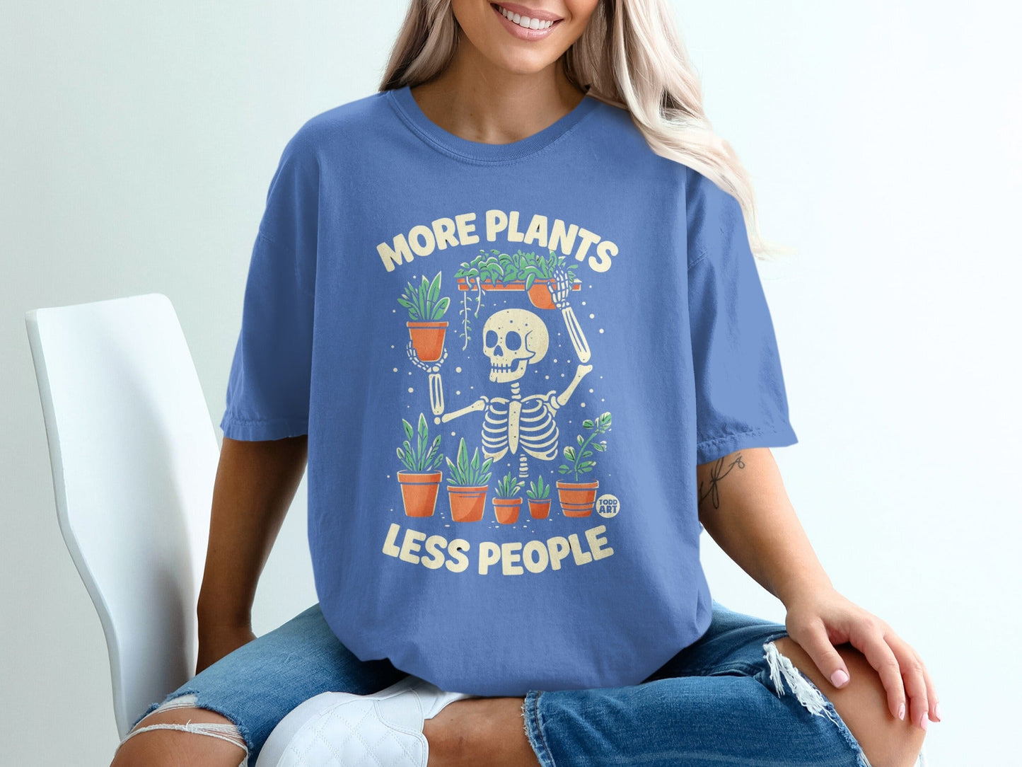 Skeleton holding potted plants, text reads "More Plants, Less People."