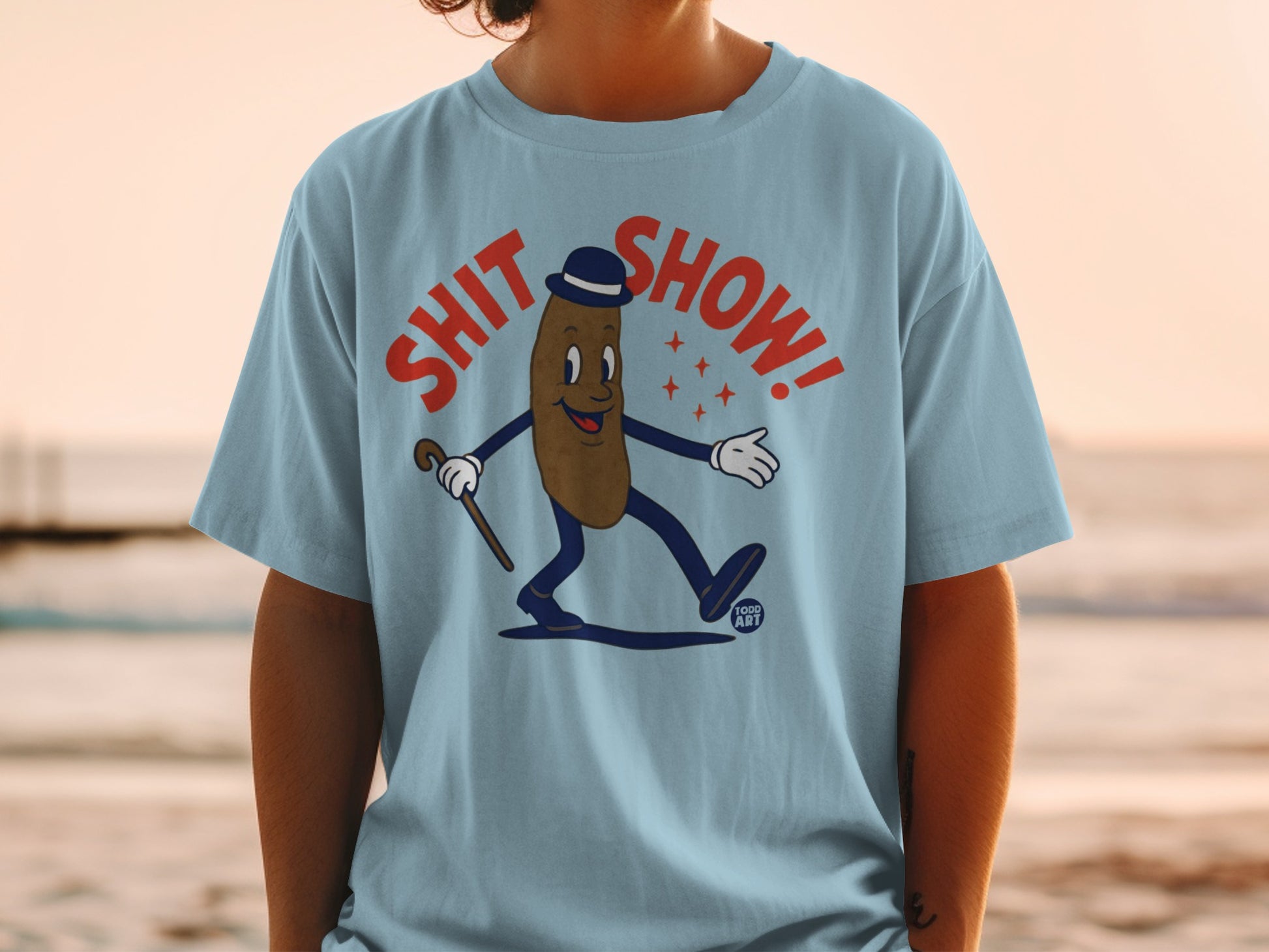 Cartoon poop character in a hat and cane with "SHIT SHOW!" text.