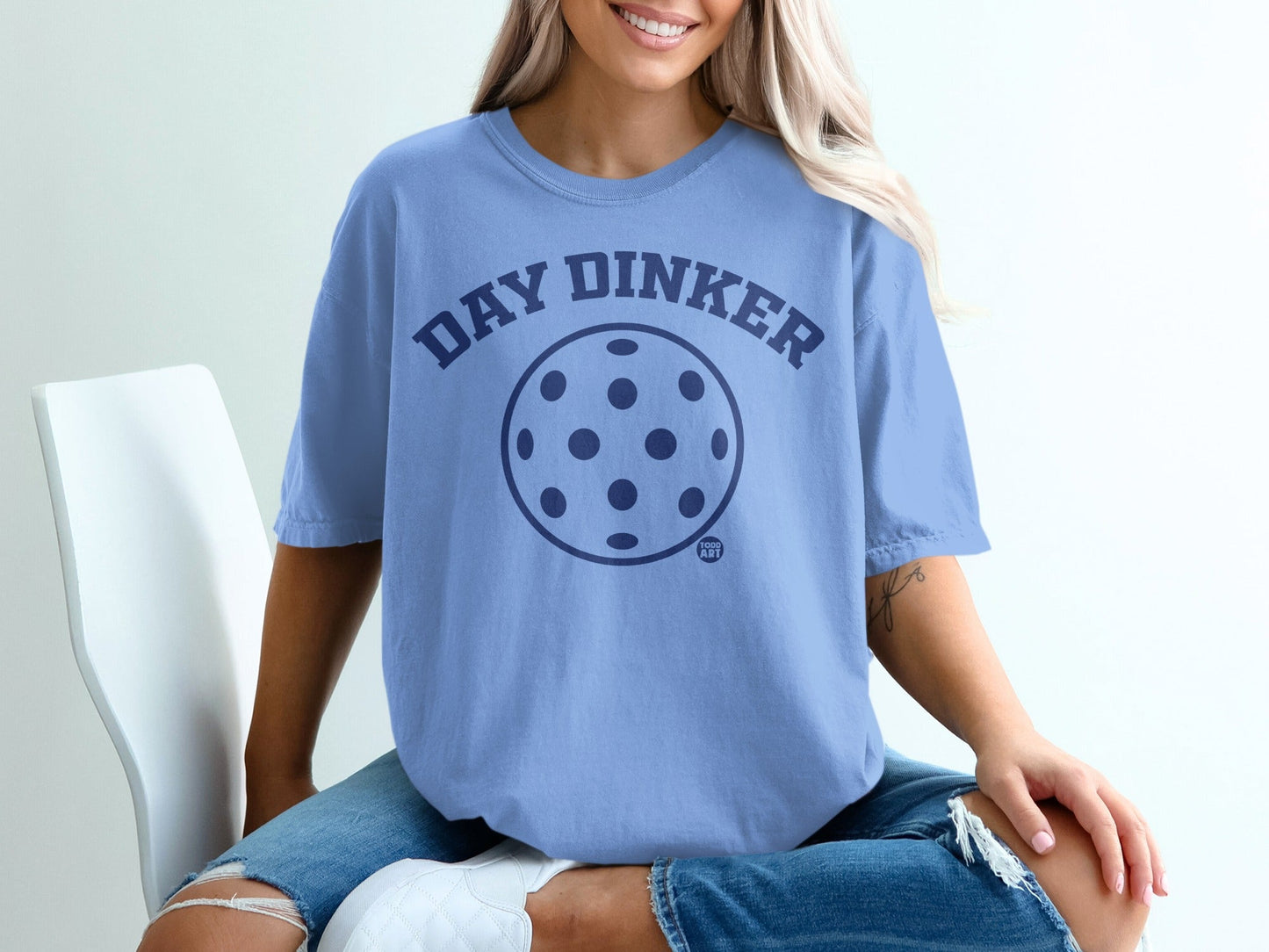 Blue t-shirt with "DAY DINKER" and pickleball graphic.