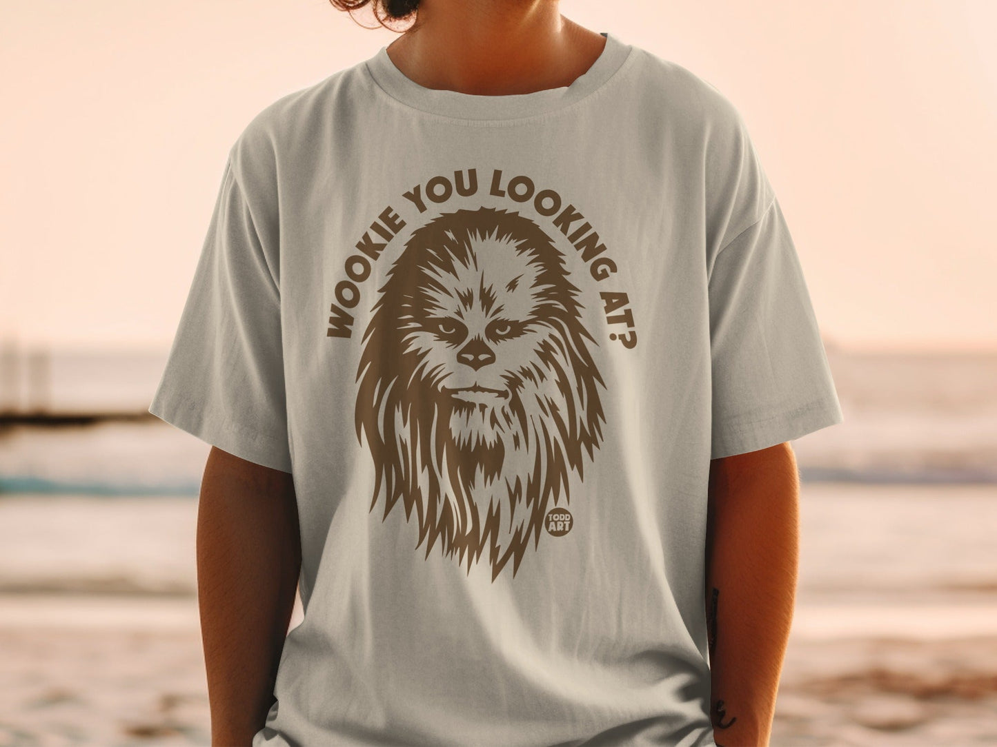 T-shirt with Chewbacca graphic and "Wookiee You Looking At?" text.