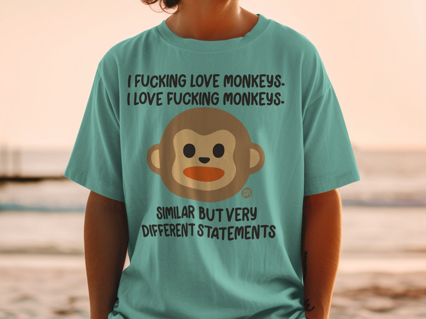 T-shirt with cartoon monkey and text "I FUCKING LOVE MONKEYS" and "SIMILAR BUT VERY DIFFERENT STATEMENTS".