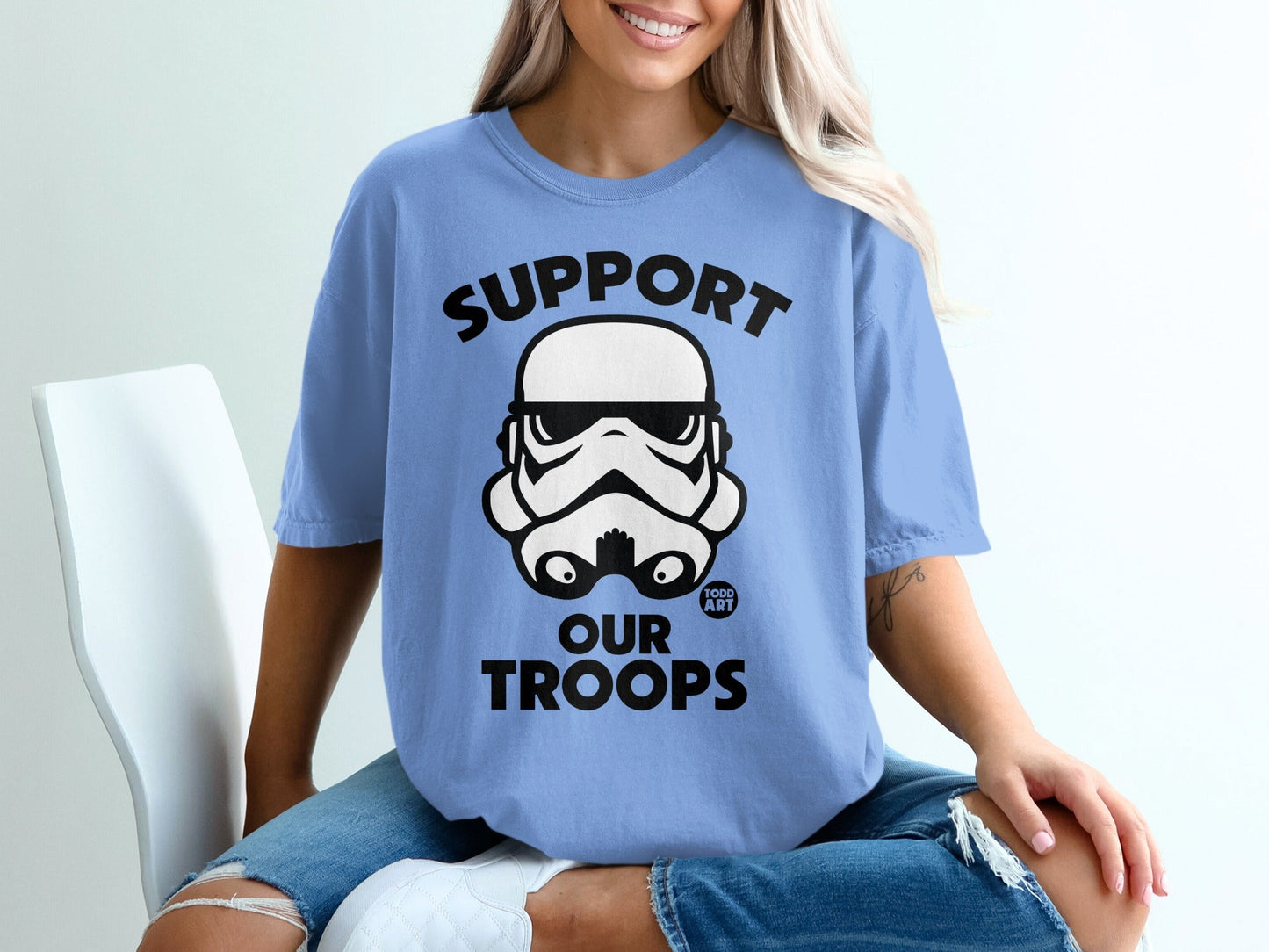 Blue t-shirt with "SUPPORT OUR TROOPS" and Stormtrooper helmet graphic.