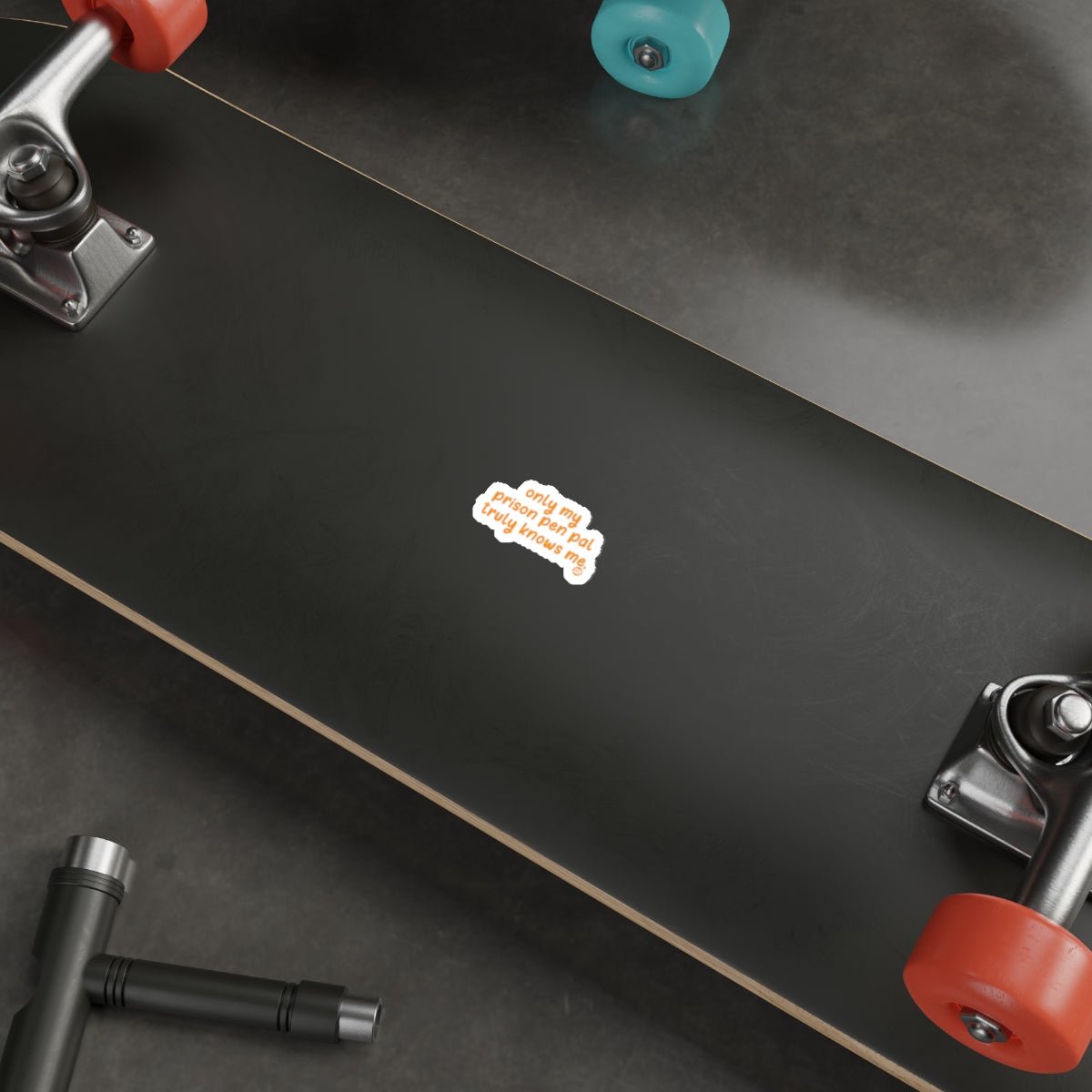 Skateboard with black deck and colorful wheels product