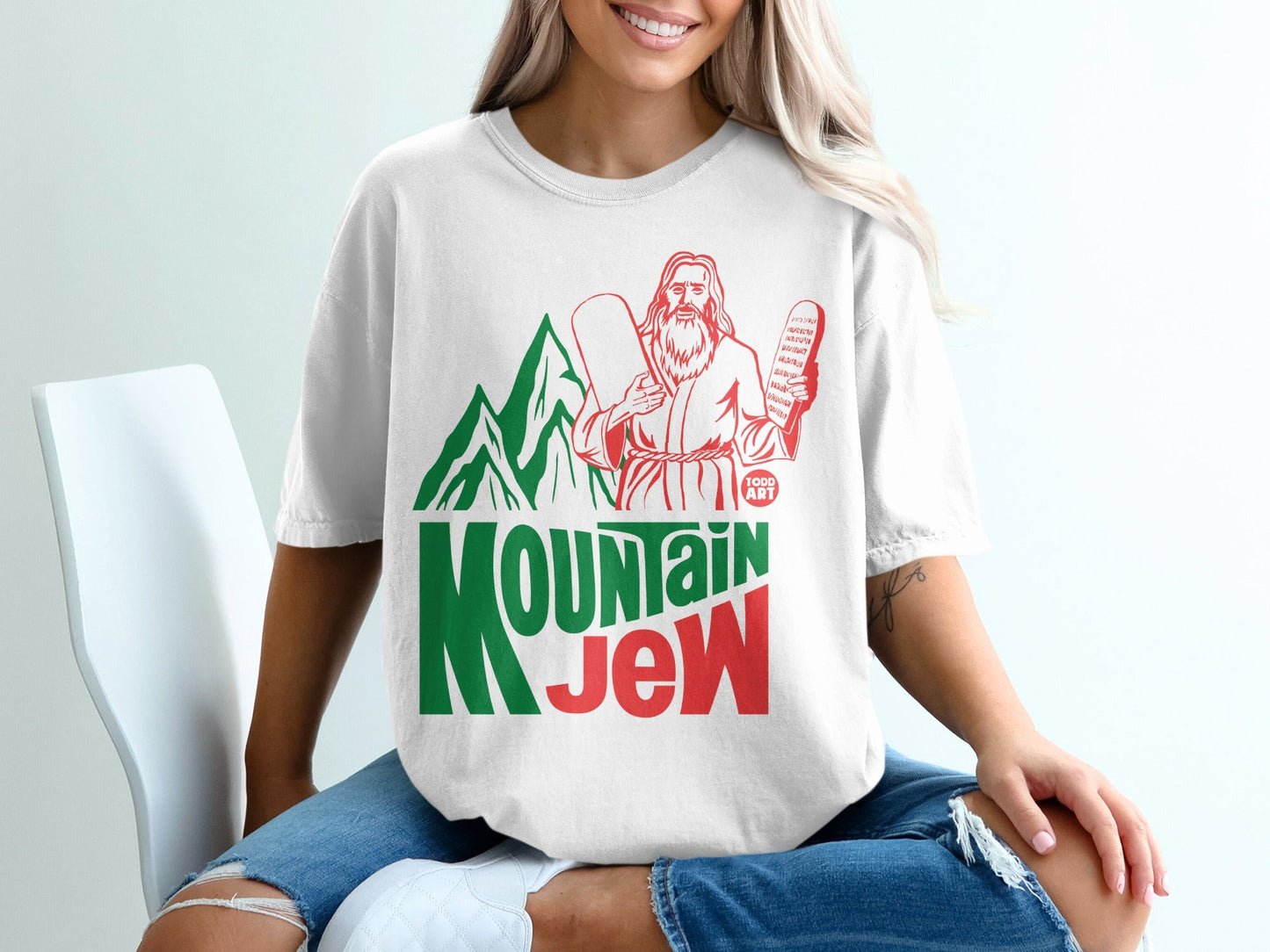 T-shirt with "Mountain Jew" text and Moses holding tablets.