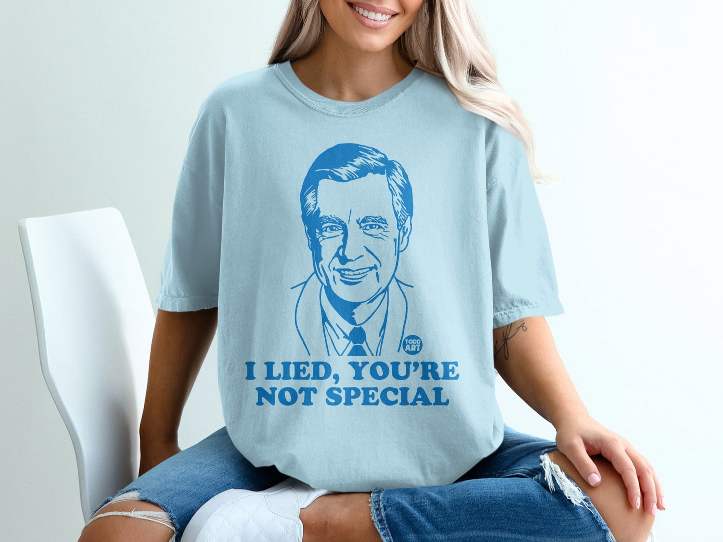 Light blue t-shirt with Mister Rogers and the text "I lied, you're not special".