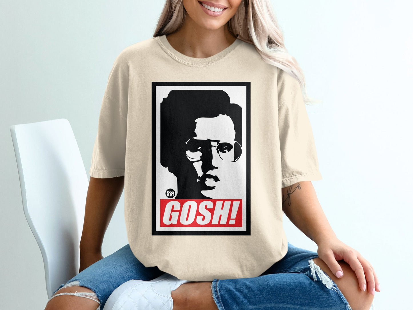 T-shirt with "GOSH!" text and a portrait of a person with glasses.