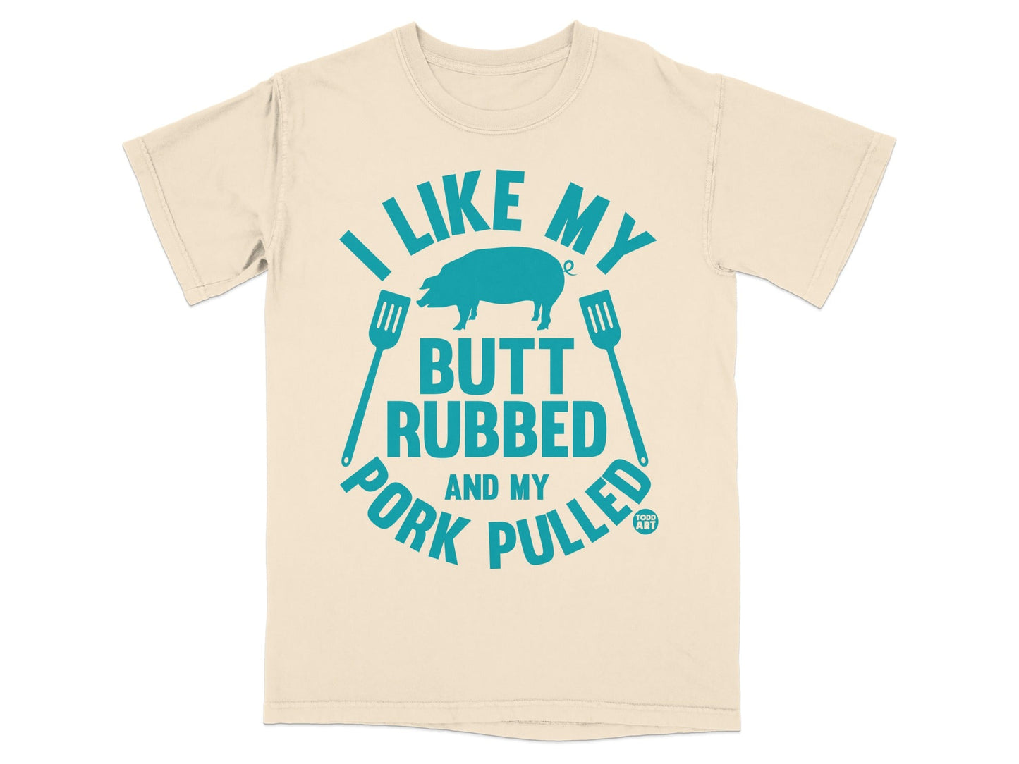 T-shirt with text "I like my butt rubbed and my pork pulled" and two spatulas.