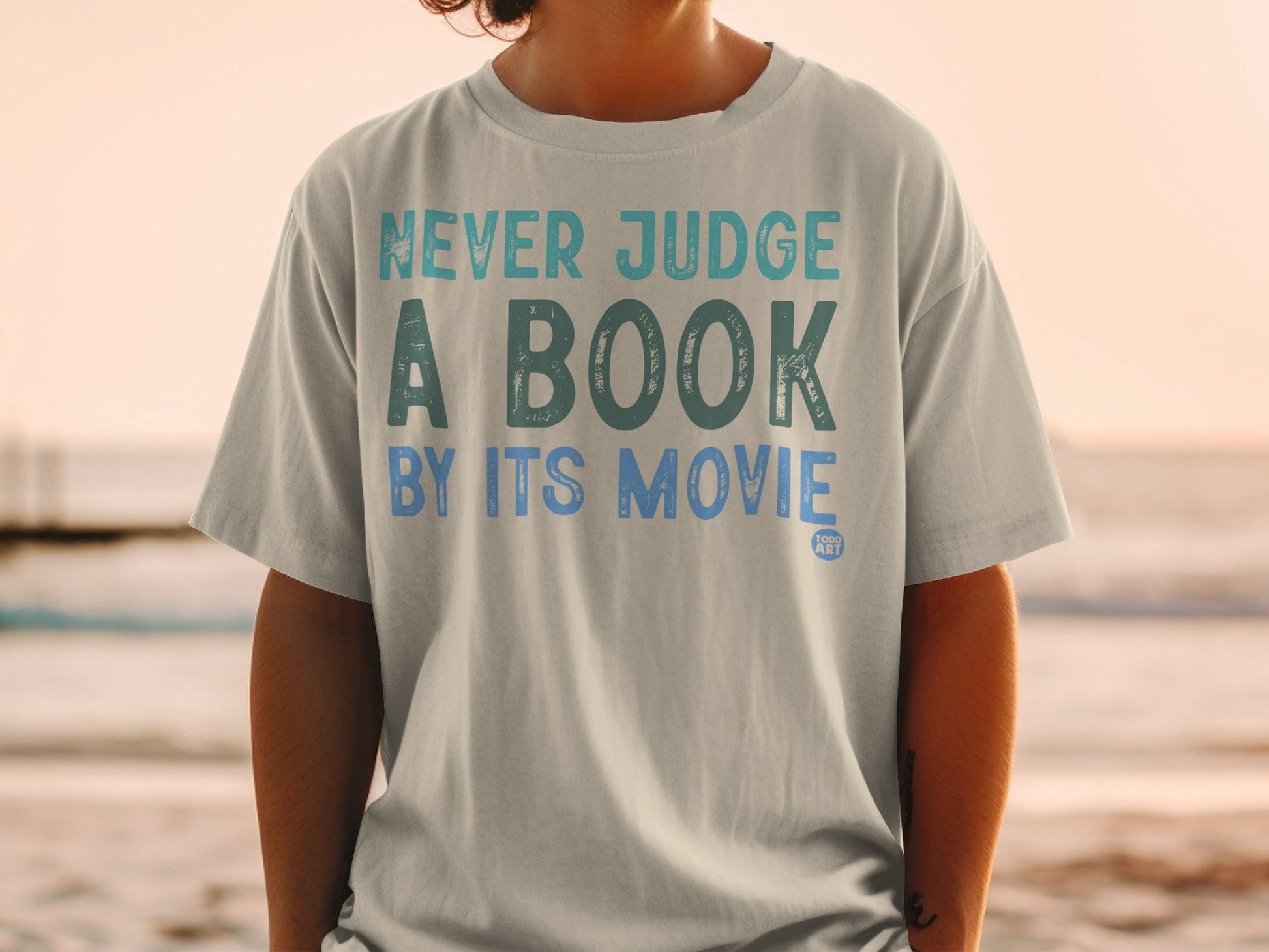 Never Judge A Book By Its Movie T-Shirt Product