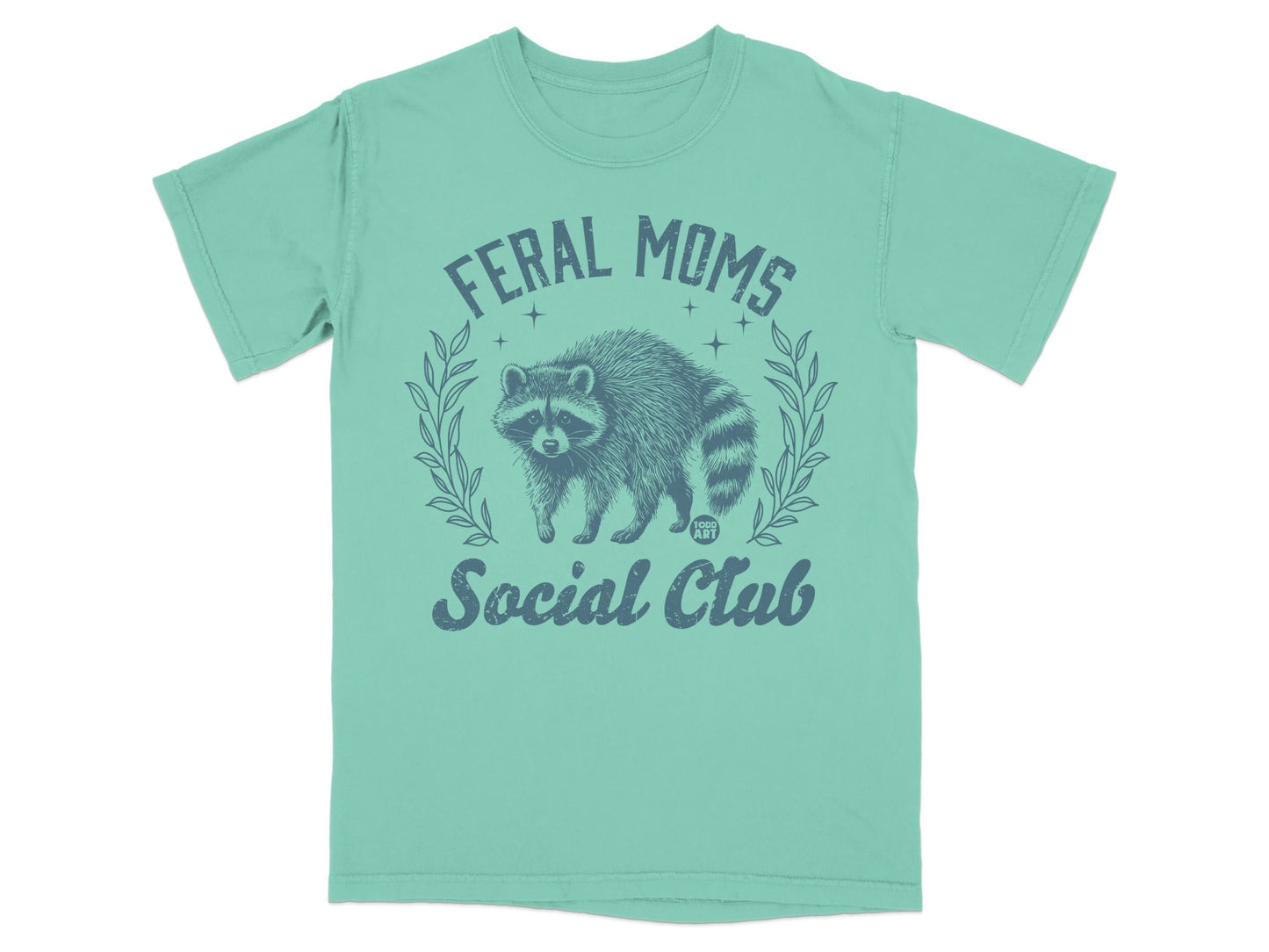 Teal t-shirt with raccoon graphic and "Feral Moms Social Club" text.