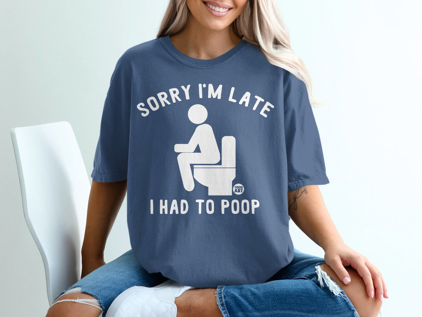 Blue t-shirt with white text and graphic: "Sorry I'm Late, I Had To Poop."