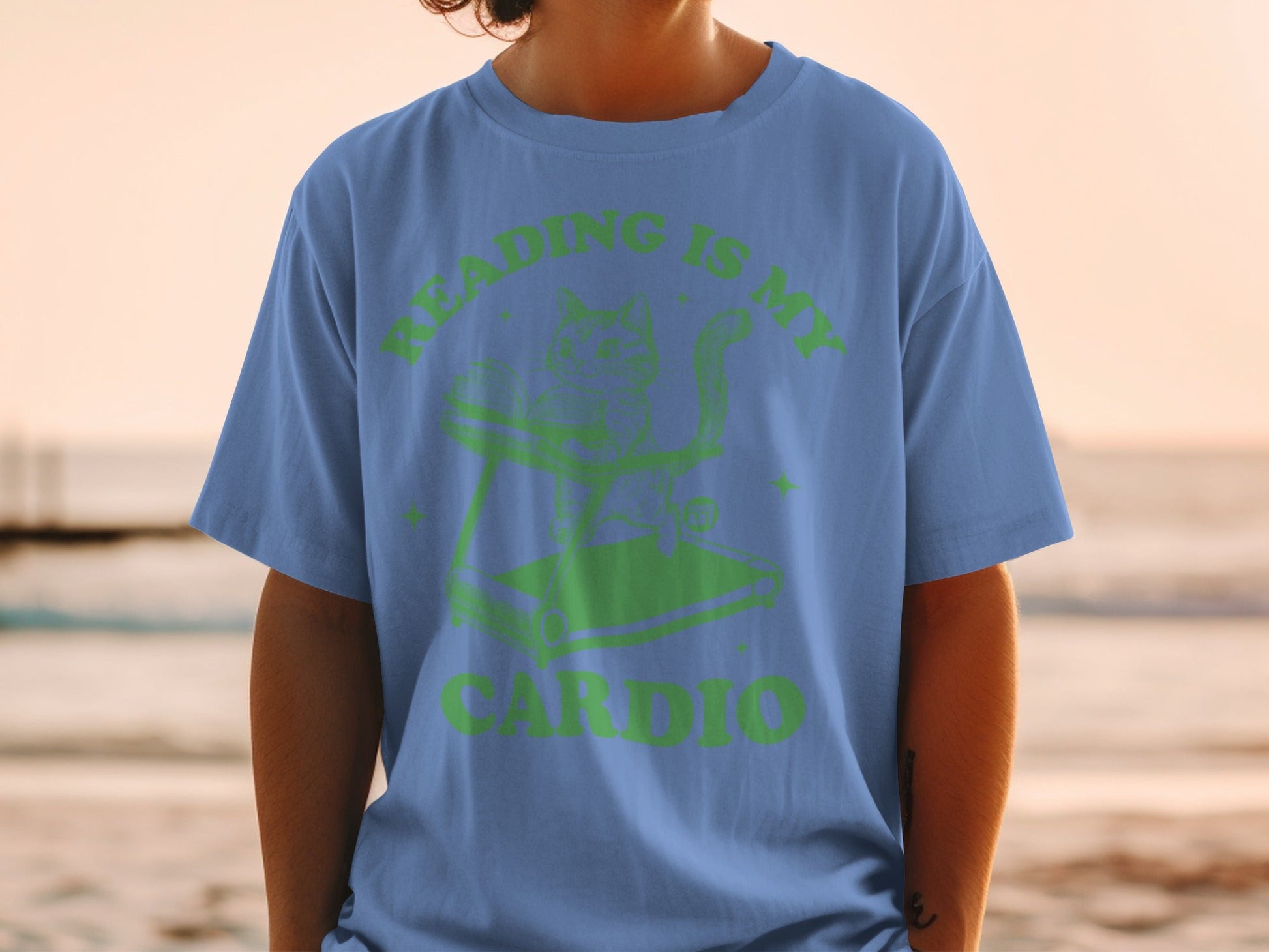 Reading Is My Cardio Cat Treadmill Graphic Shirt