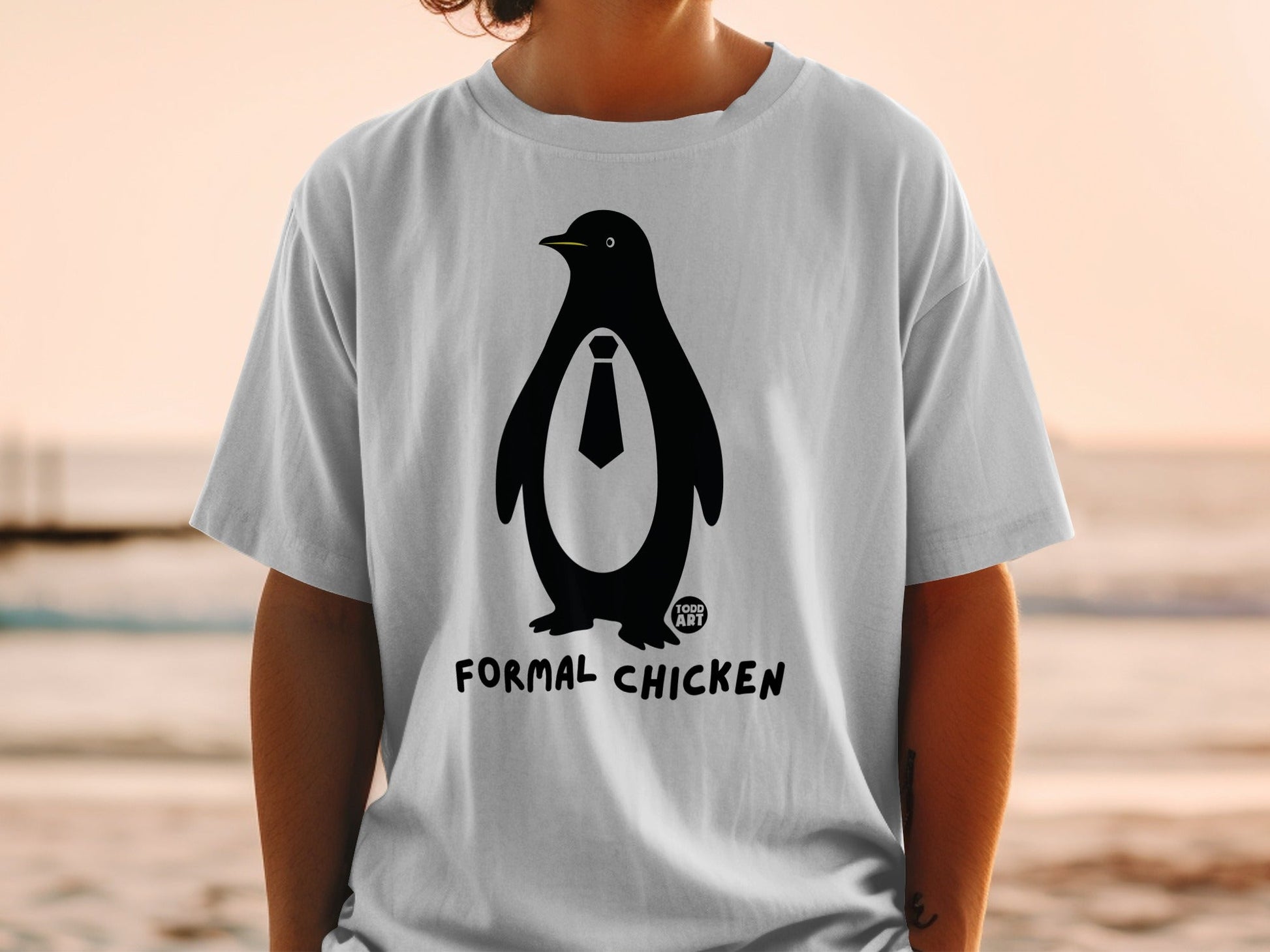 Black penguin wearing a tie, with "FORMAL CHICKEN" text below.