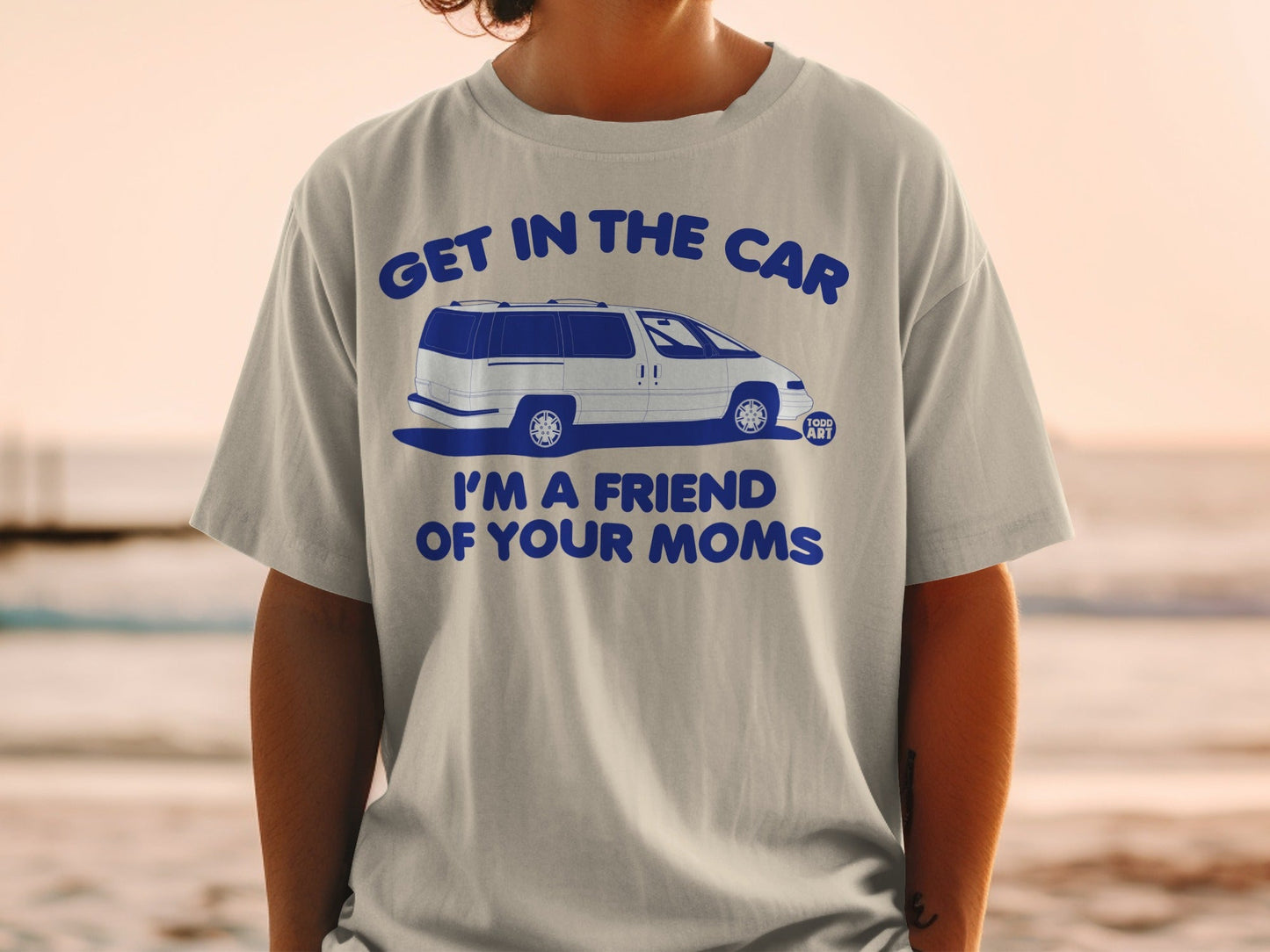 Gray t-shirt with blue text and a minivan graphic.