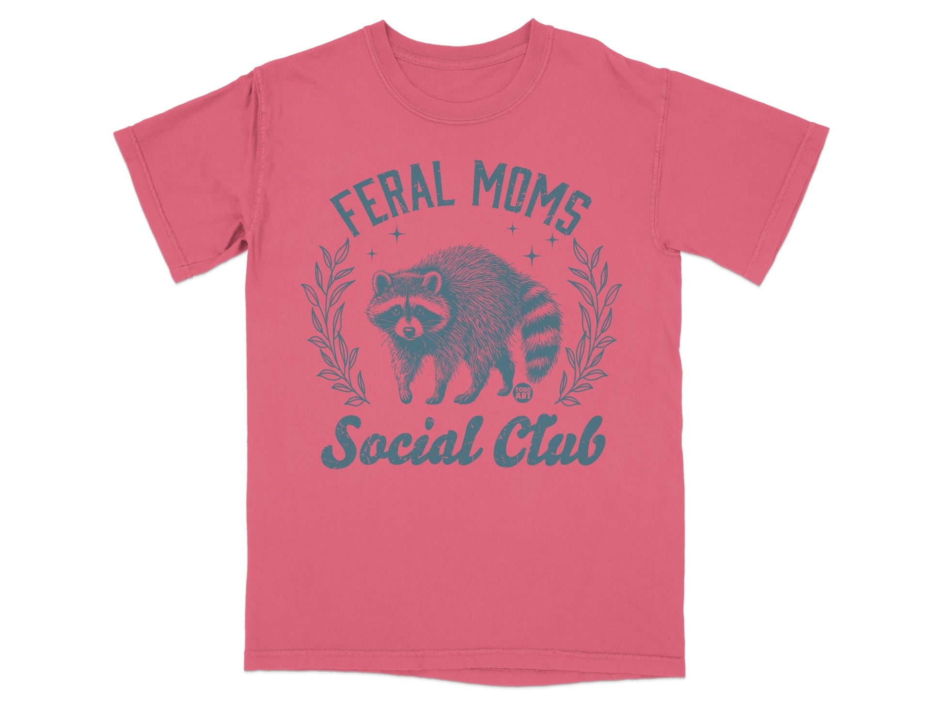 Coral t-shirt with distressed raccoon and "Feral Moms Social Club" text.