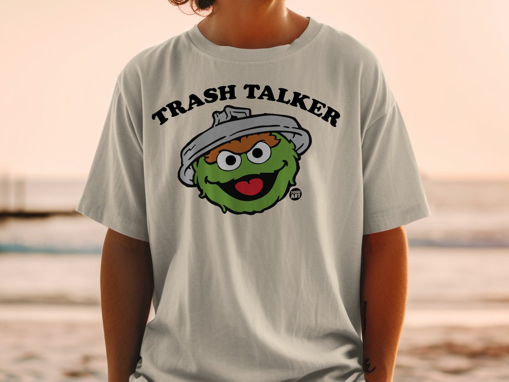 T-shirt with cartoon Oscar the Grouch saying "Trash Talker."