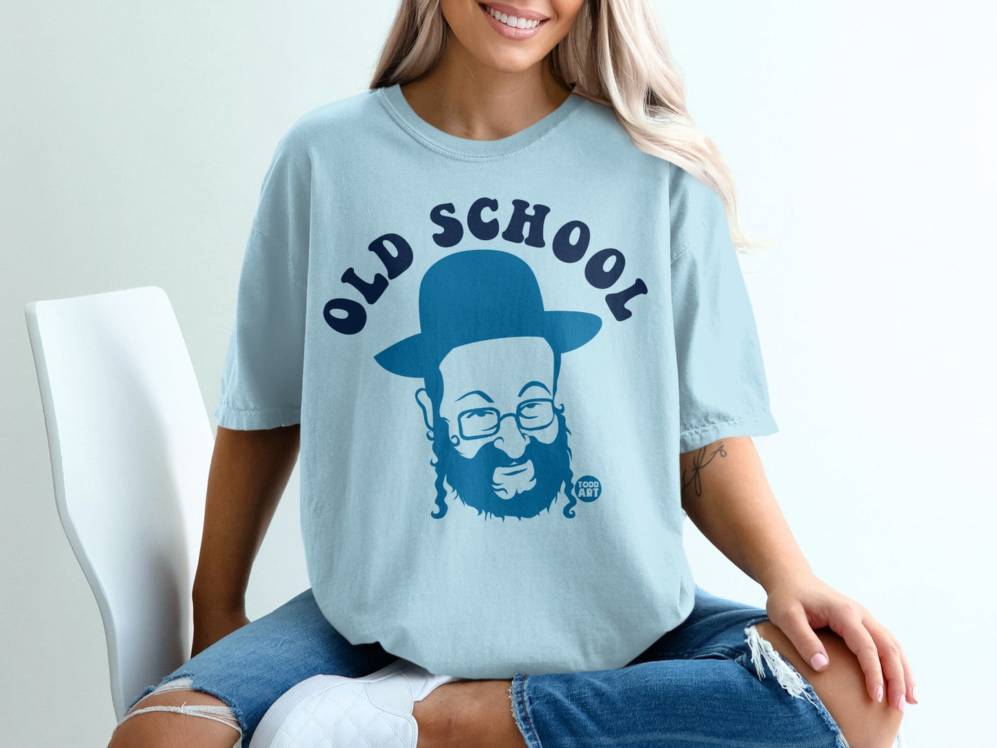 Light blue t-shirt with "Old School" text and cartoon illustration of a man.