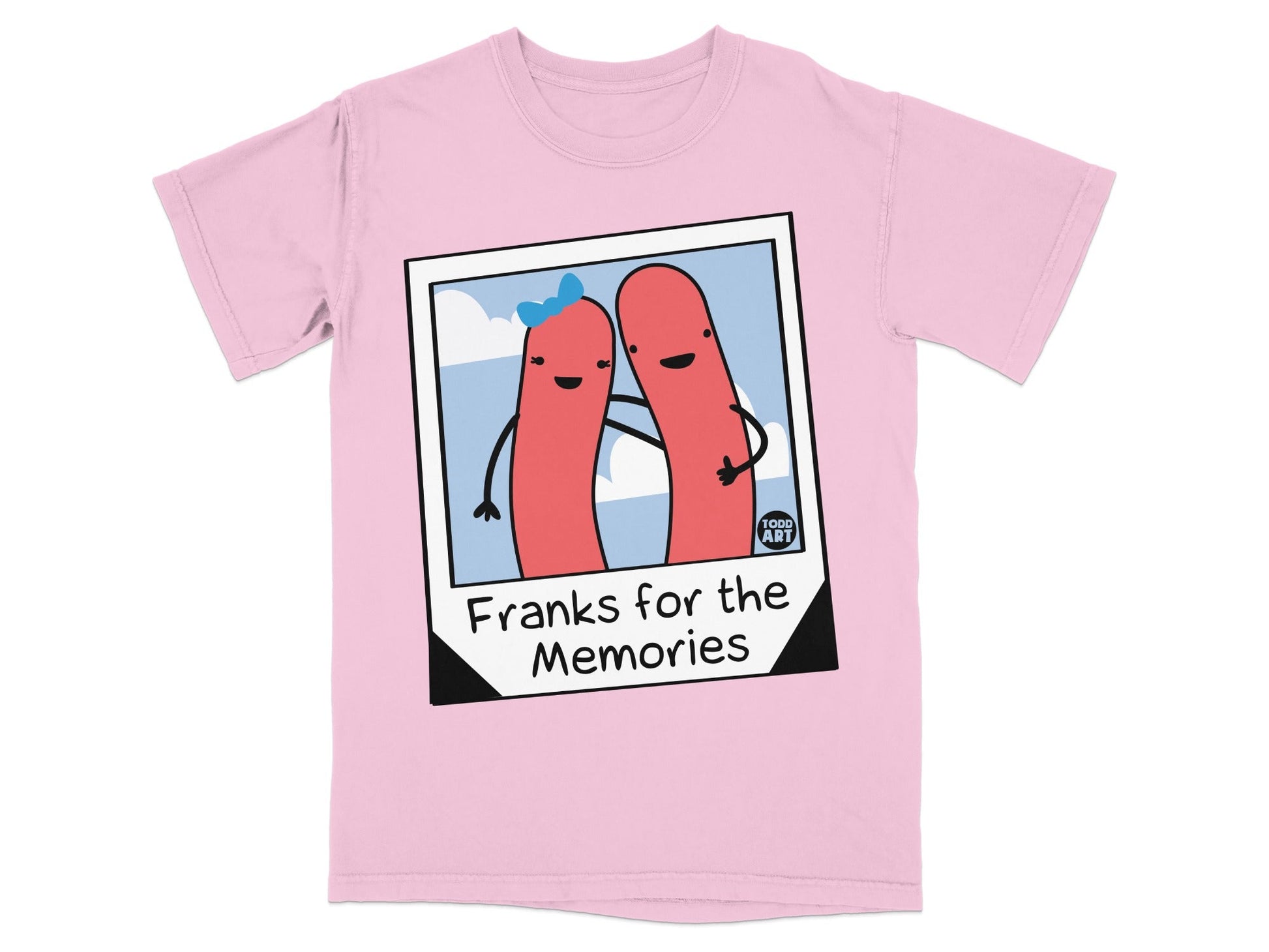 Pink t-shirt with a polaroid of two hot dogs saying "Franks for the Memories".