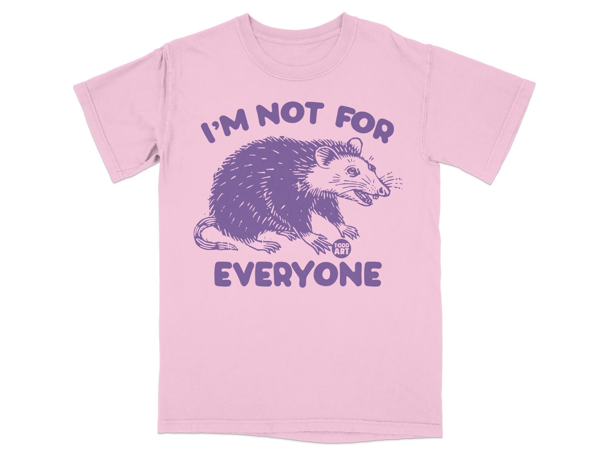 Pink t-shirt with purple possum graphic and text "I'm Not For Everyone".