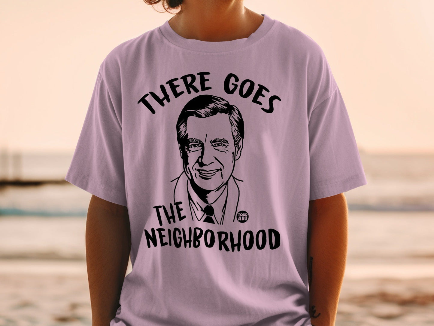 T-shirt with black illustration of Fred Rogers and text "There Goes the Neighborhood".