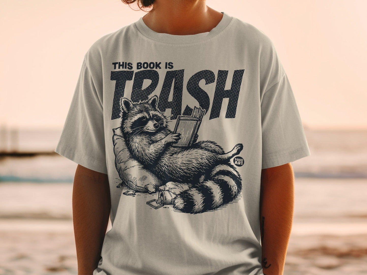 This Book is Trash Funny Graphic Raccoon T-Shirt Product