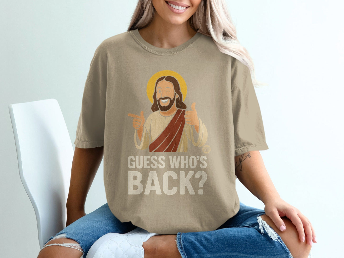 T-shirt with Jesus giving thumbs up and text "GUESS WHO'S BACK?".