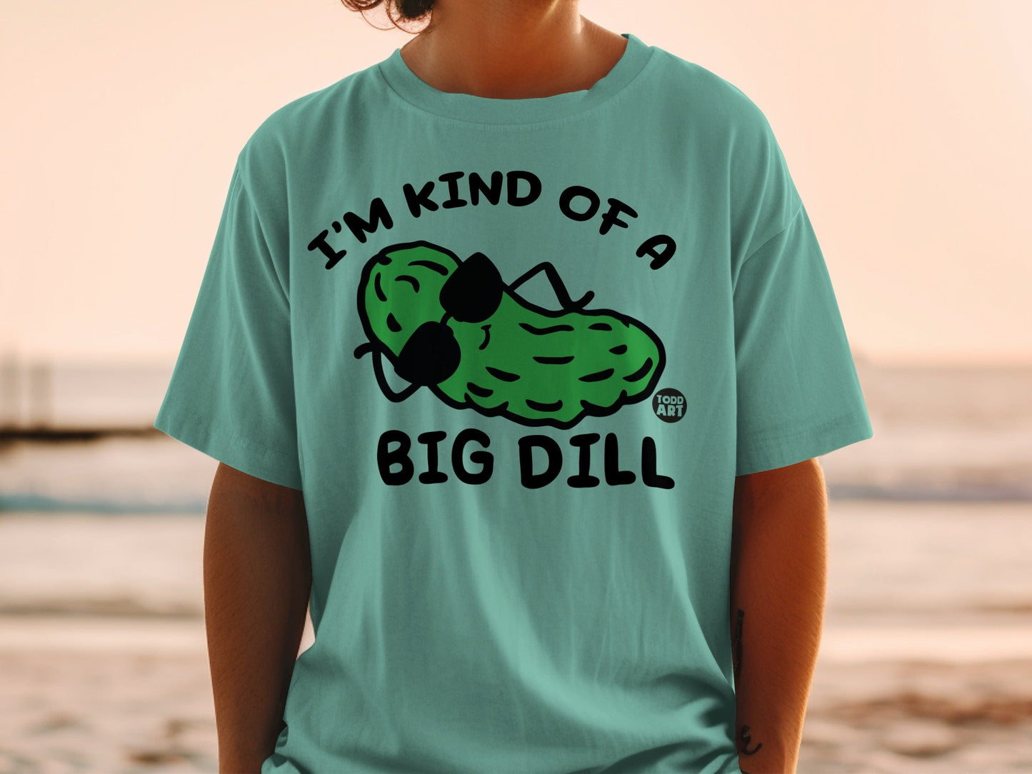 Turquoise t-shirt with "I'M KIND OF A BIG DILL" and pickle graphic.