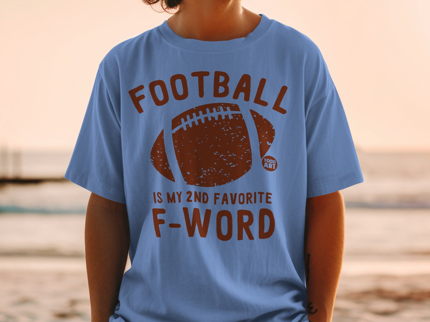 Blue t-shirt with "FOOTBALL IS MY 2ND FAVORITE F-WORD" and football graphic.